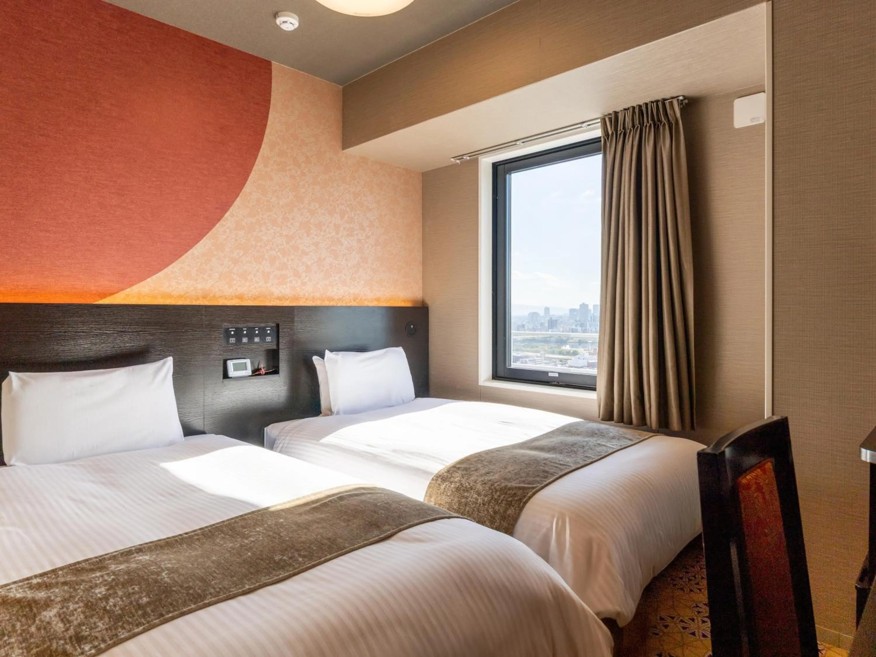 Photo of the whole room, Bed in APA Hotel Shin Osaka Ekimae Tower