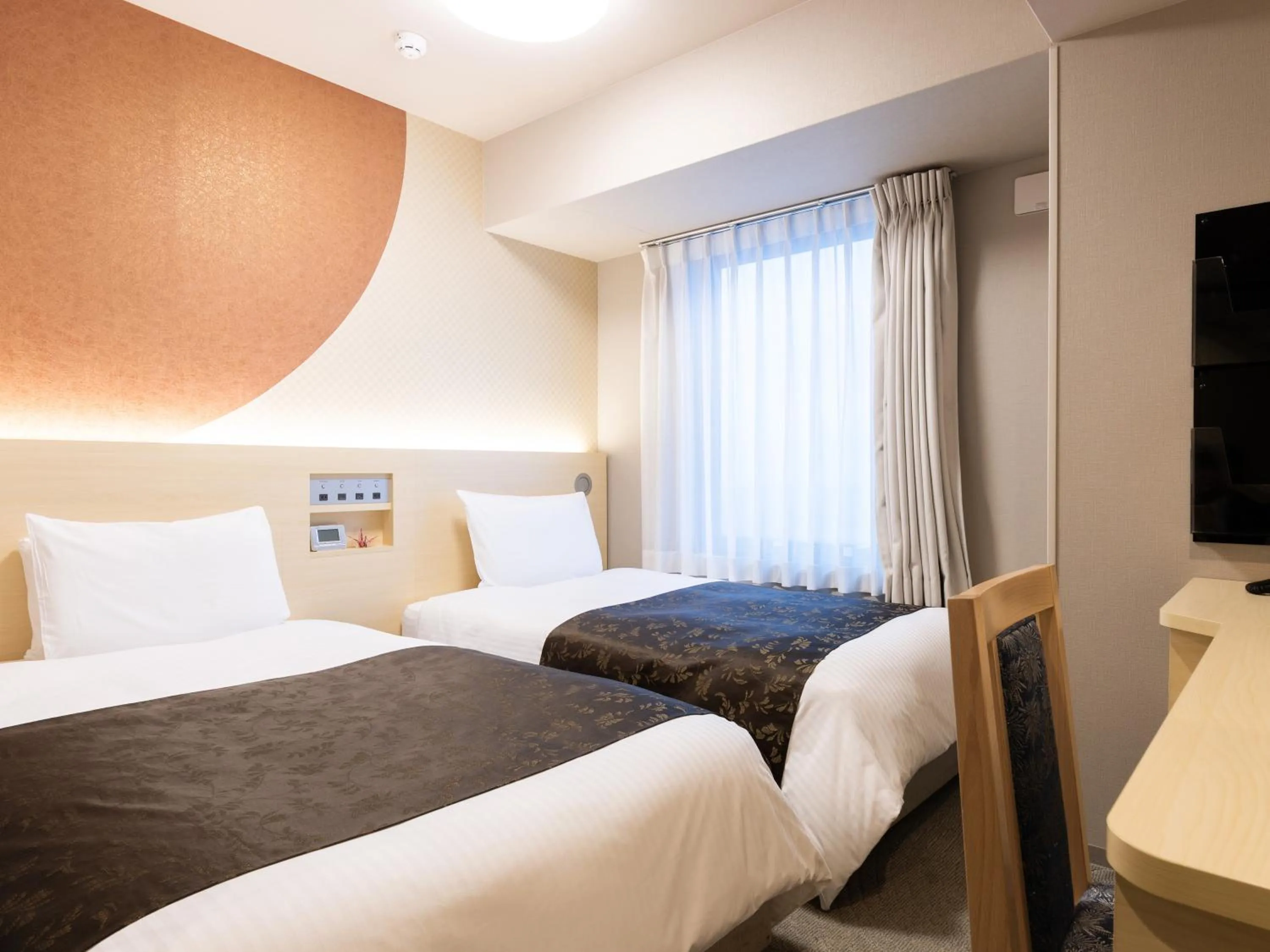 Photo of the whole room, Bed in APA Hotel Shin Osaka Ekimae Tower
