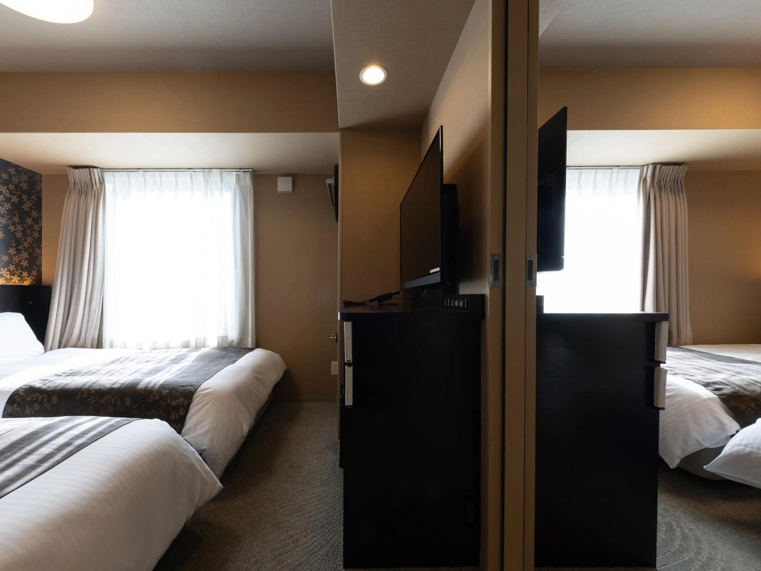 Photo of the whole room, Bed in APA Hotel Shin Osaka Ekimae Tower