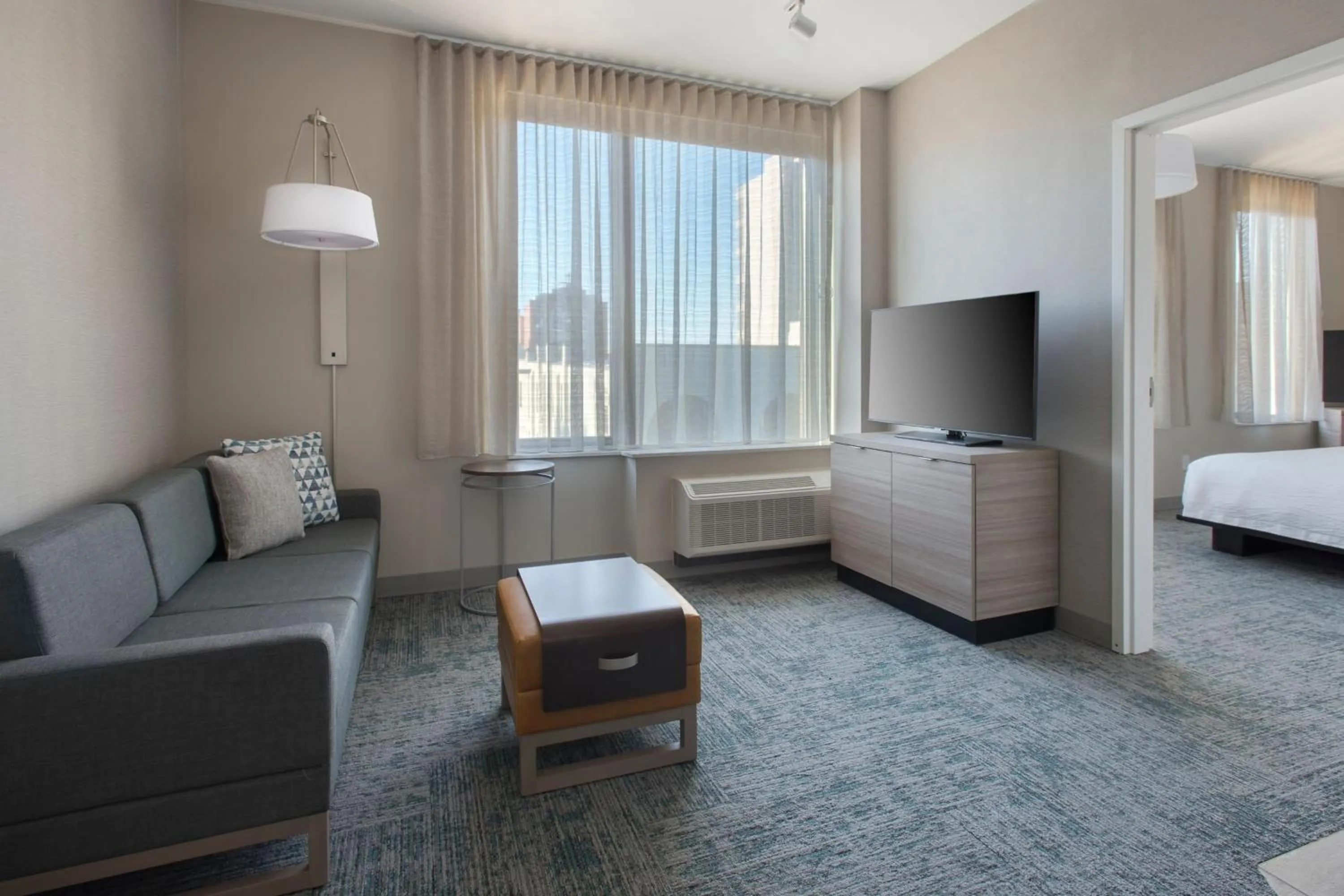 Living room, Bed in TownePlace Suites by Marriott New York Brooklyn