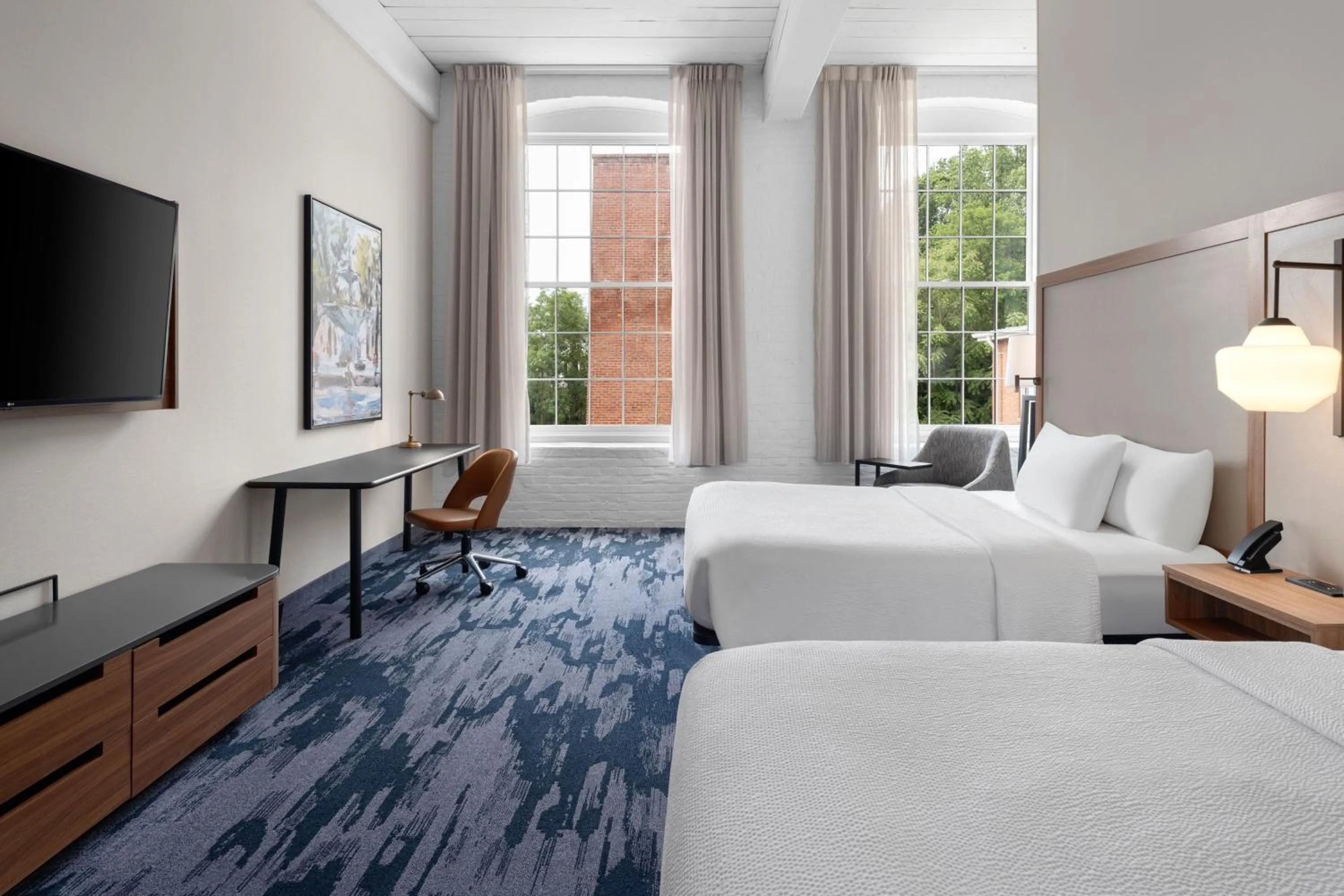 Photo of the whole room, Bed in Fairfield Inn & Suites Madison Historic Eagle Cotton Mill