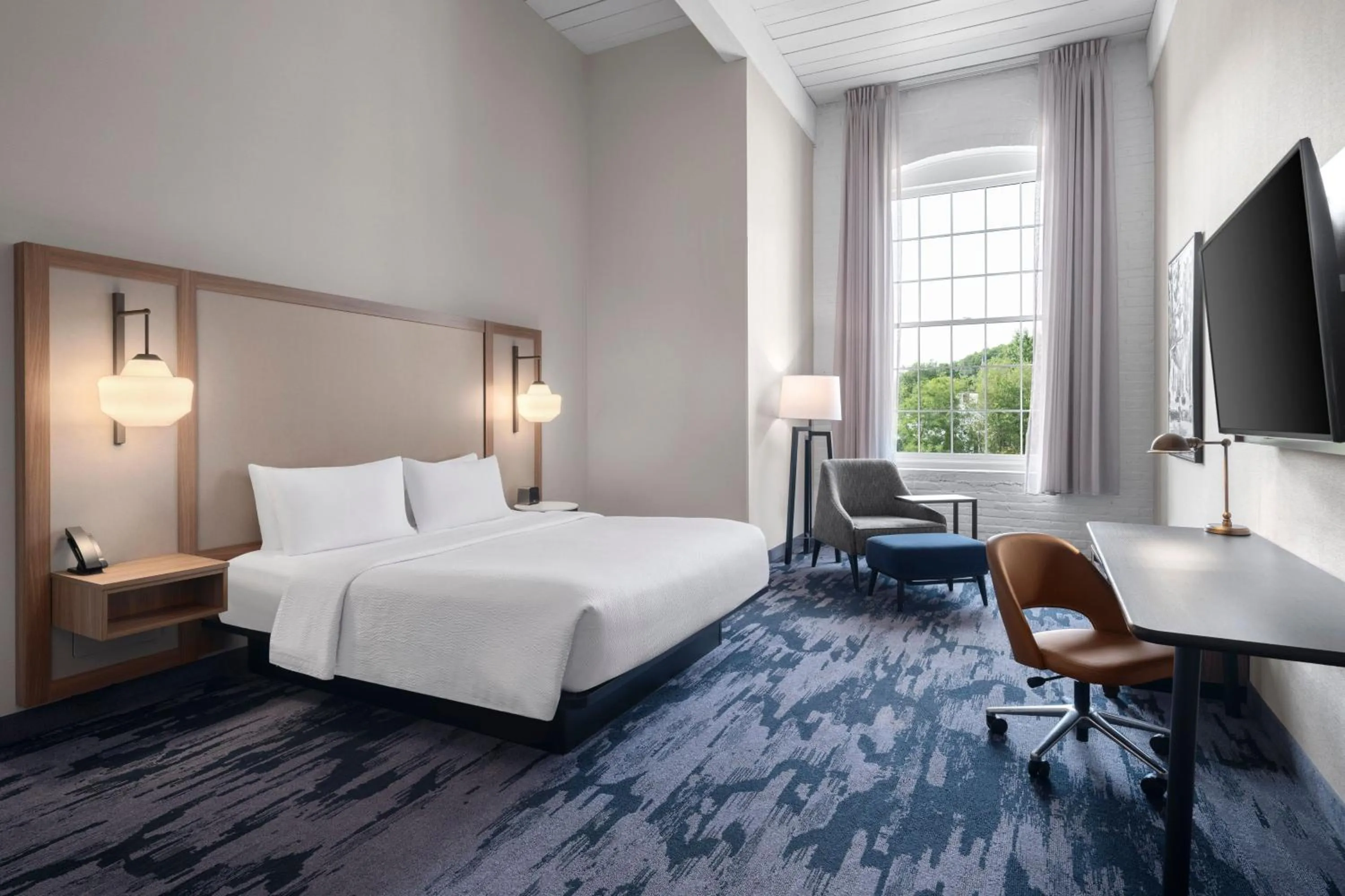 Photo of the whole room, Bed in Fairfield Inn & Suites Madison Historic Eagle Cotton Mill