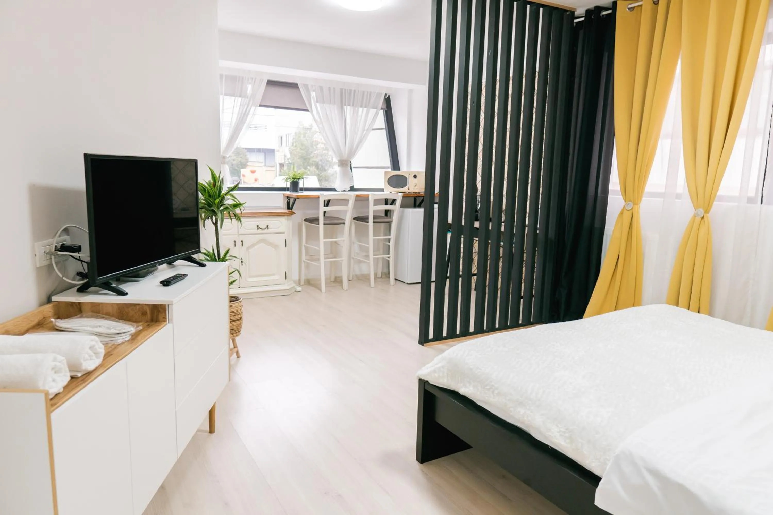 Photo of the whole room, Bed in Chic Studio