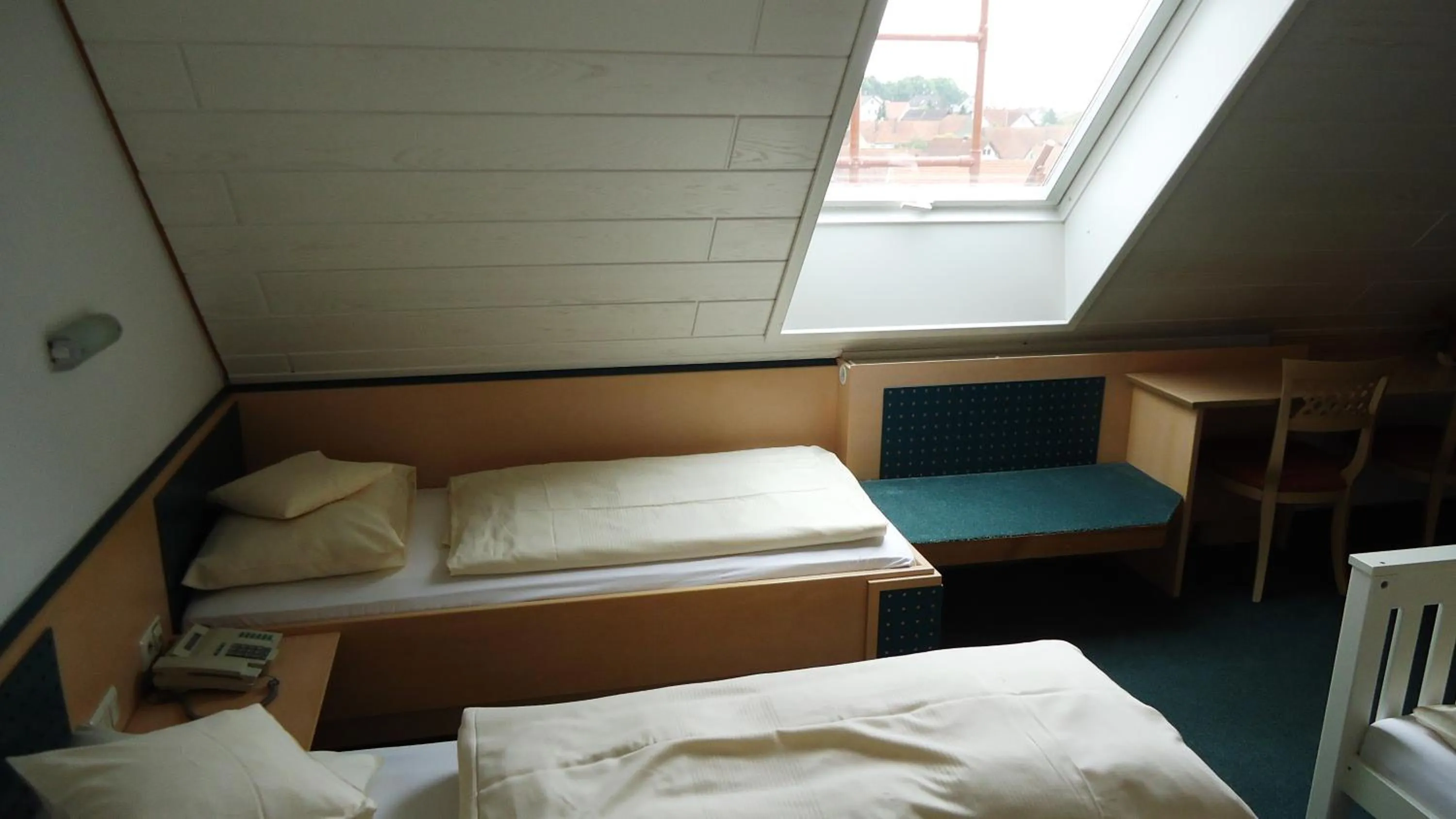 Seating area, Bed in Hotel Krone