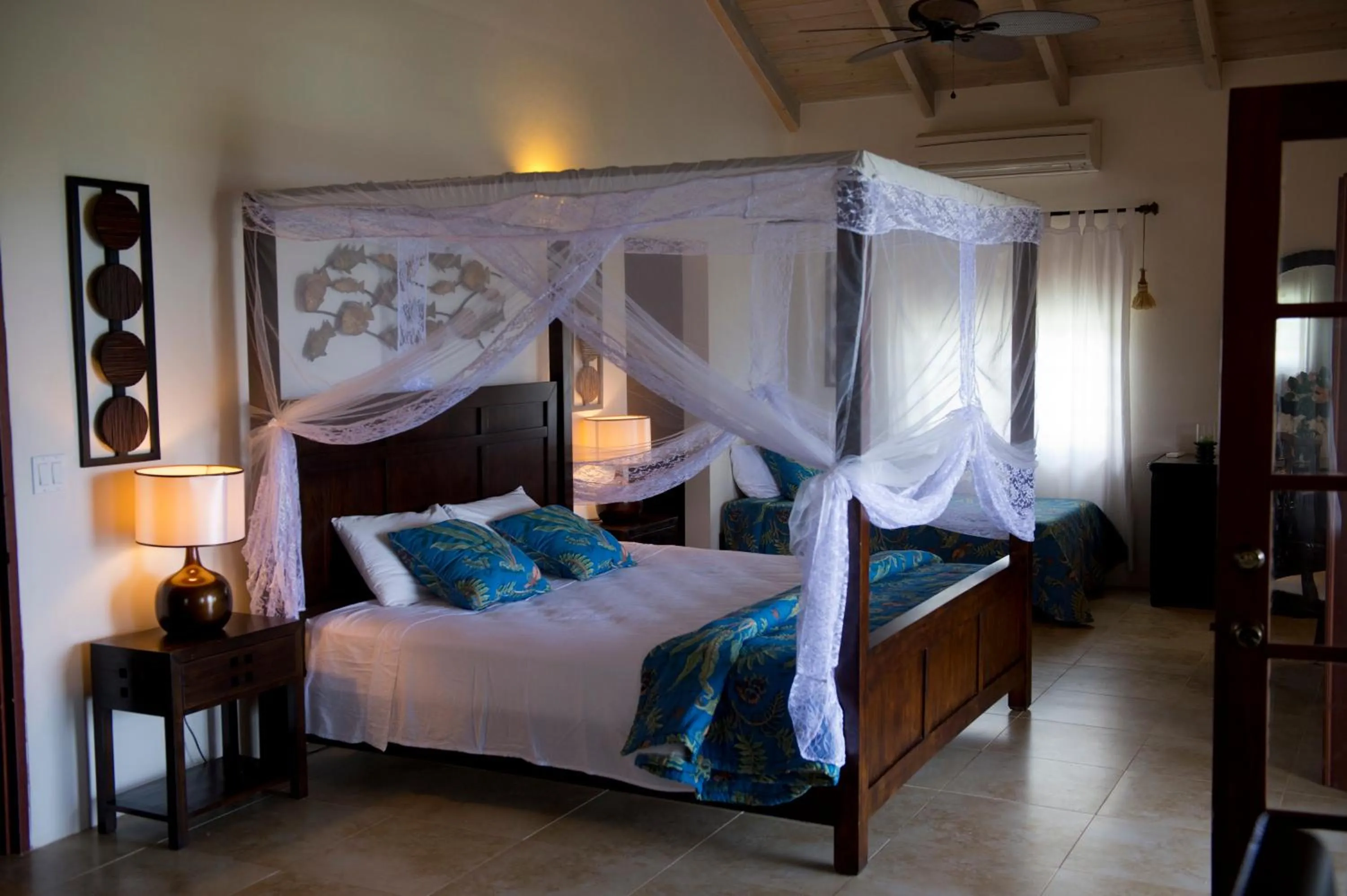 Photo of the whole room, Bed in Villa Touloulou