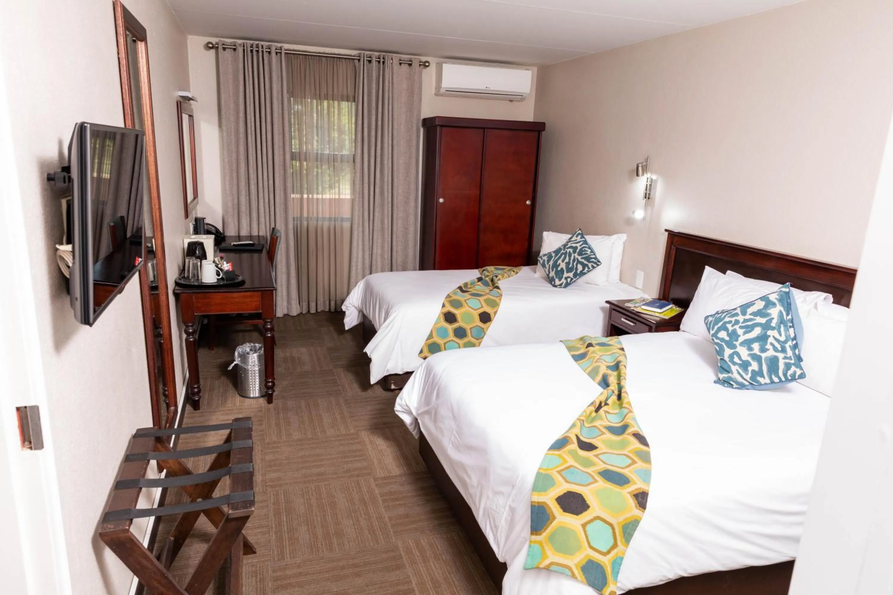 Bed in Hotel 247 @ White River