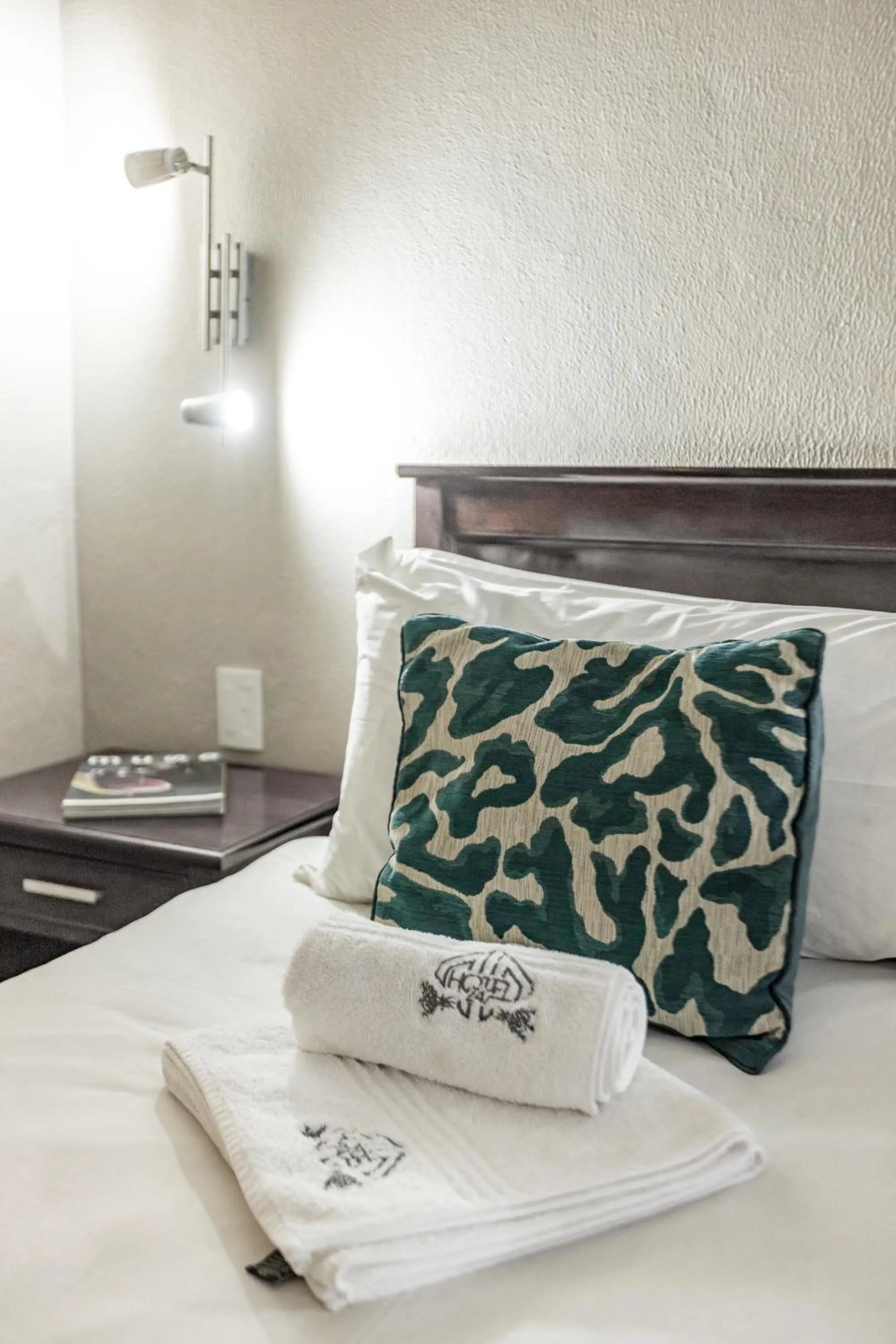 towels, Bed in Hotel 247 @ White River