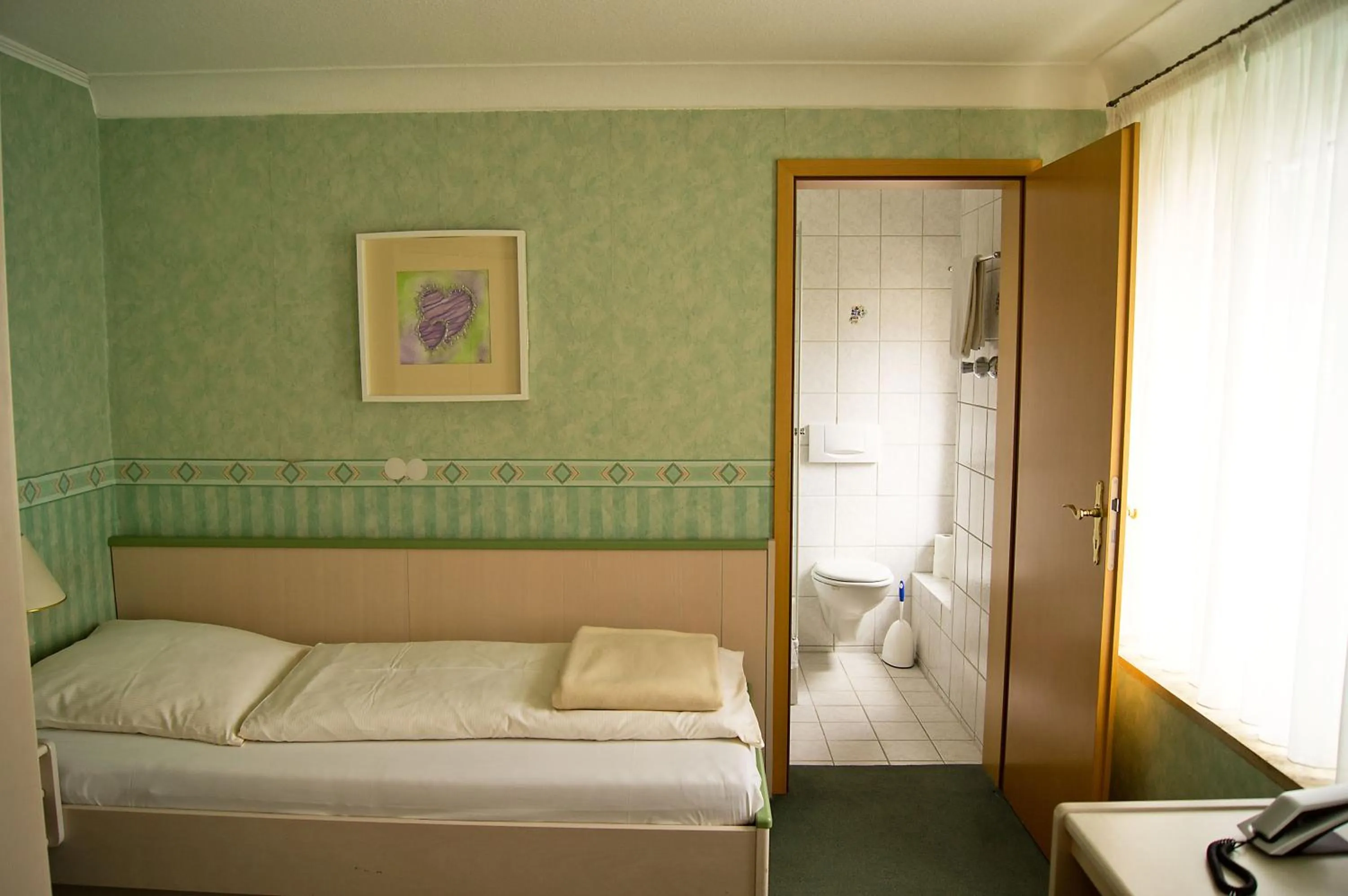 Bed in Hotel Garni Promenade