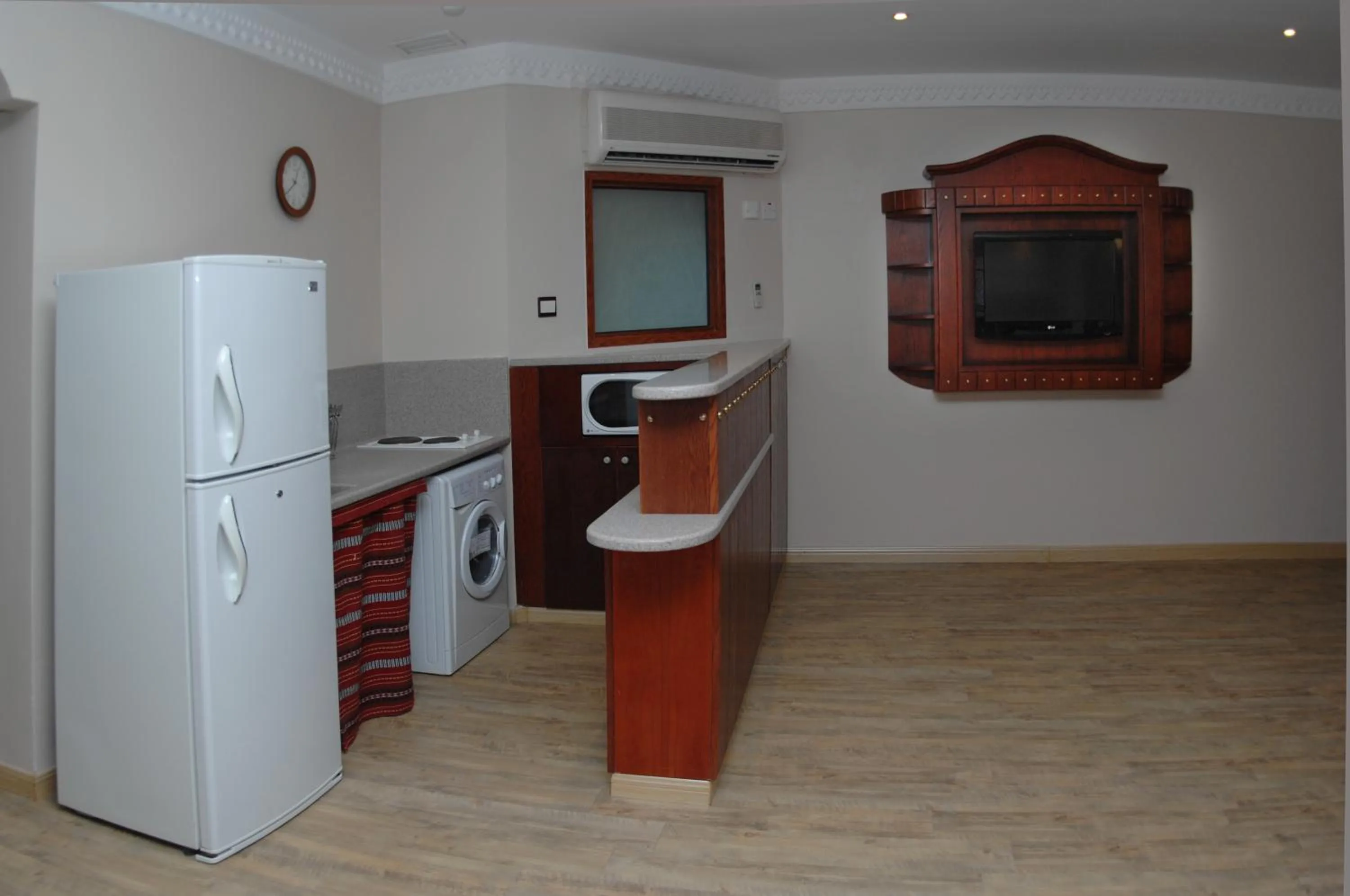 Kitchen or kitchenette in Al Liwan Suites
