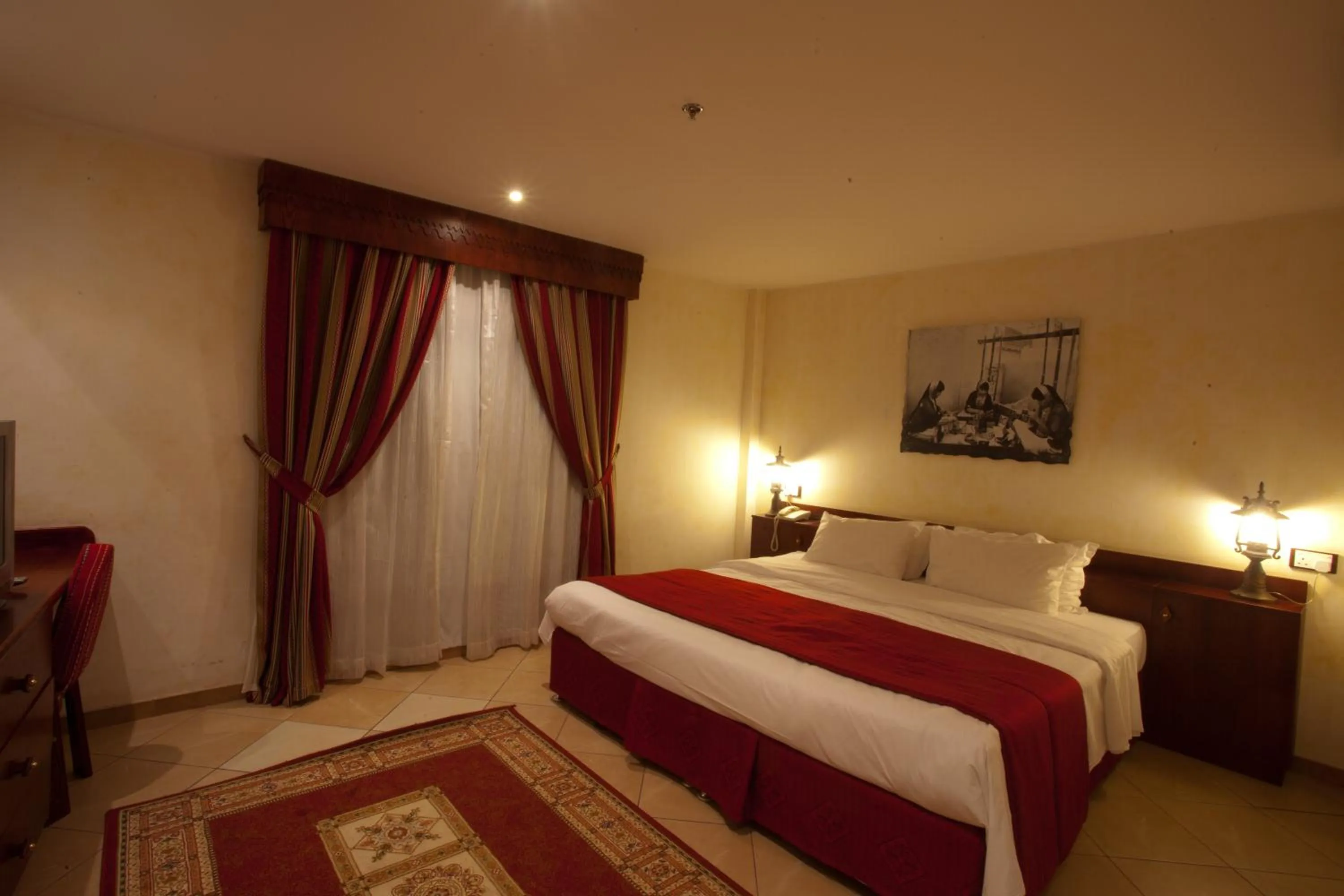 Bed in Al Liwan Suites