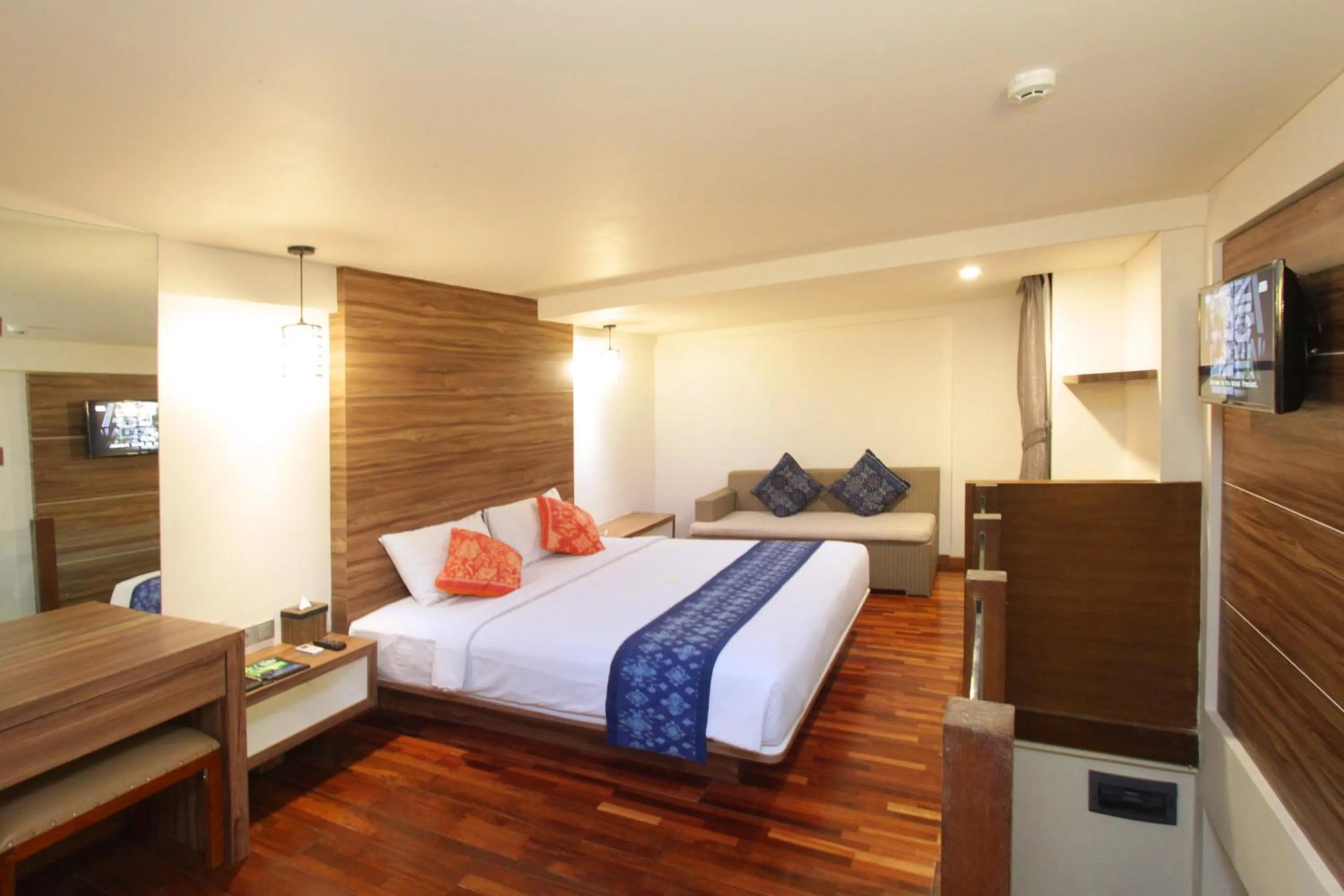 Communal lounge/ TV room, Bed in The Legian Sunset Residence
