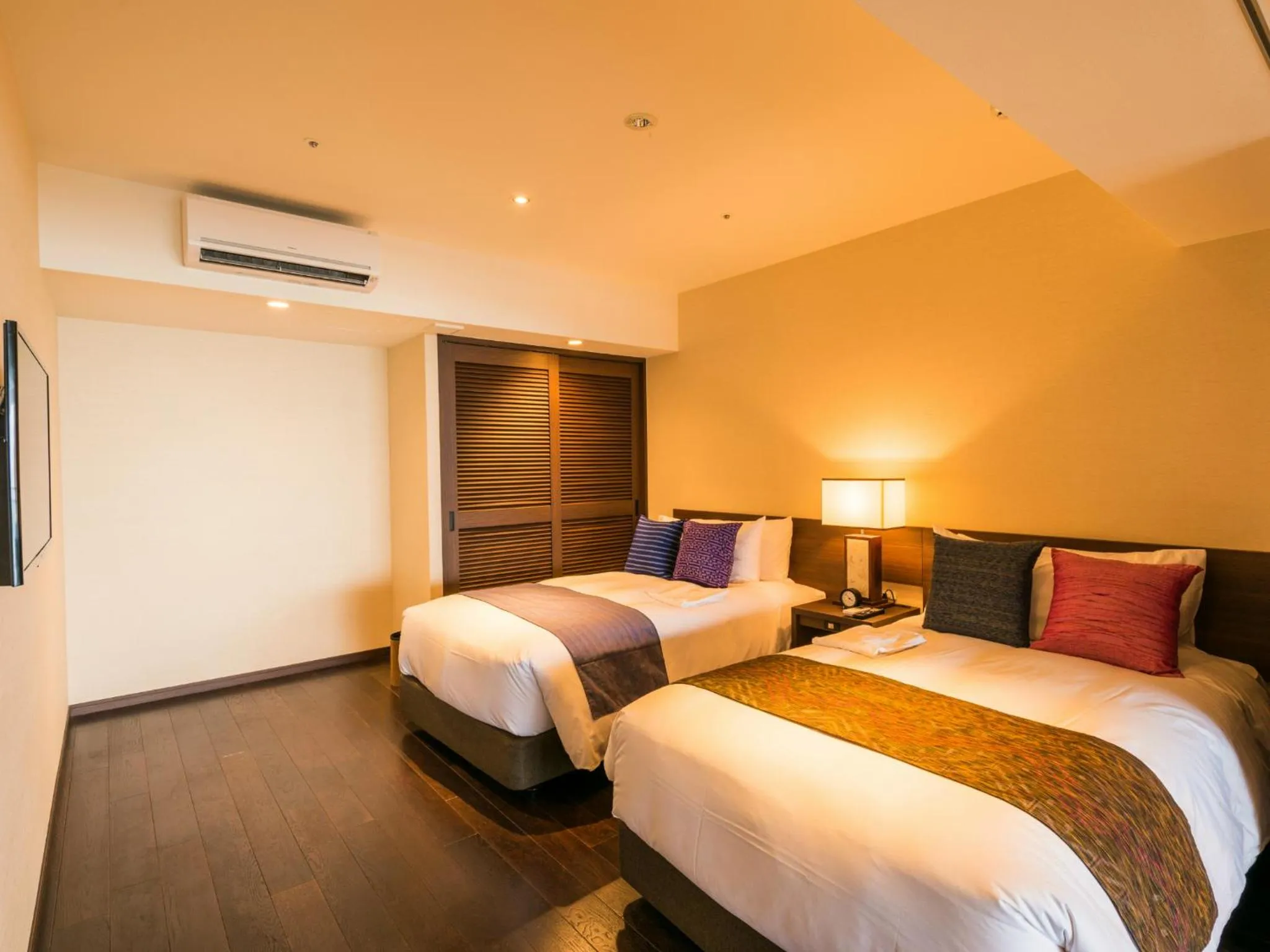 Photo of the whole room, Bed in Kafuu Resort Fuchaku Condo Hotel