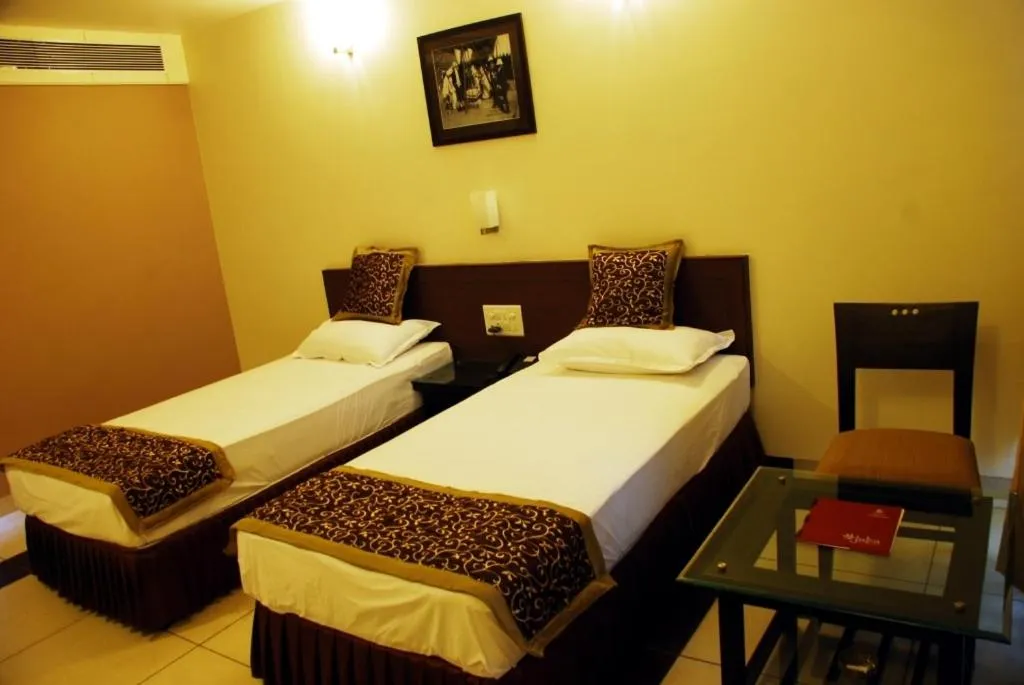 Photo of the whole room, Bed in Grand Ashirwad Beacon