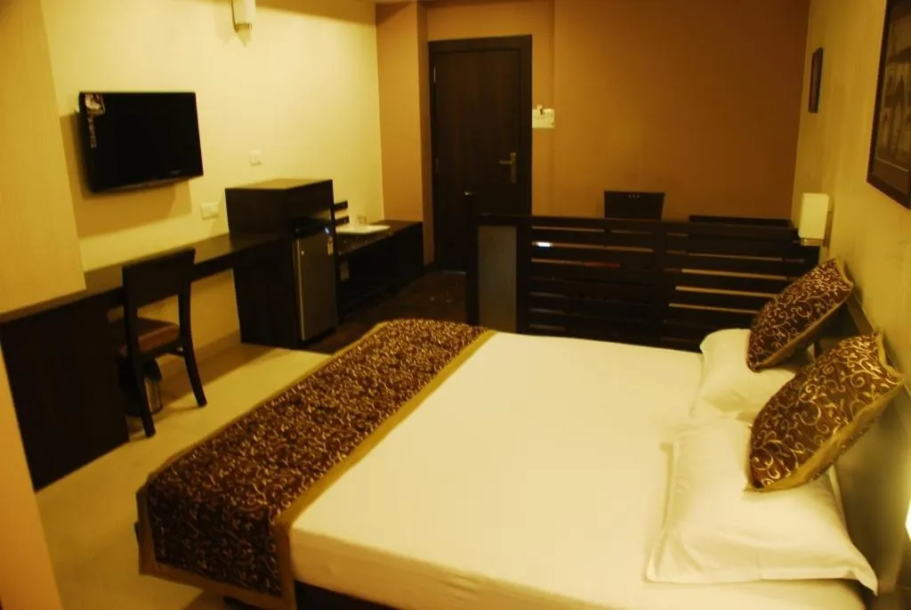 Photo of the whole room, Bed in Grand Ashirwad Beacon