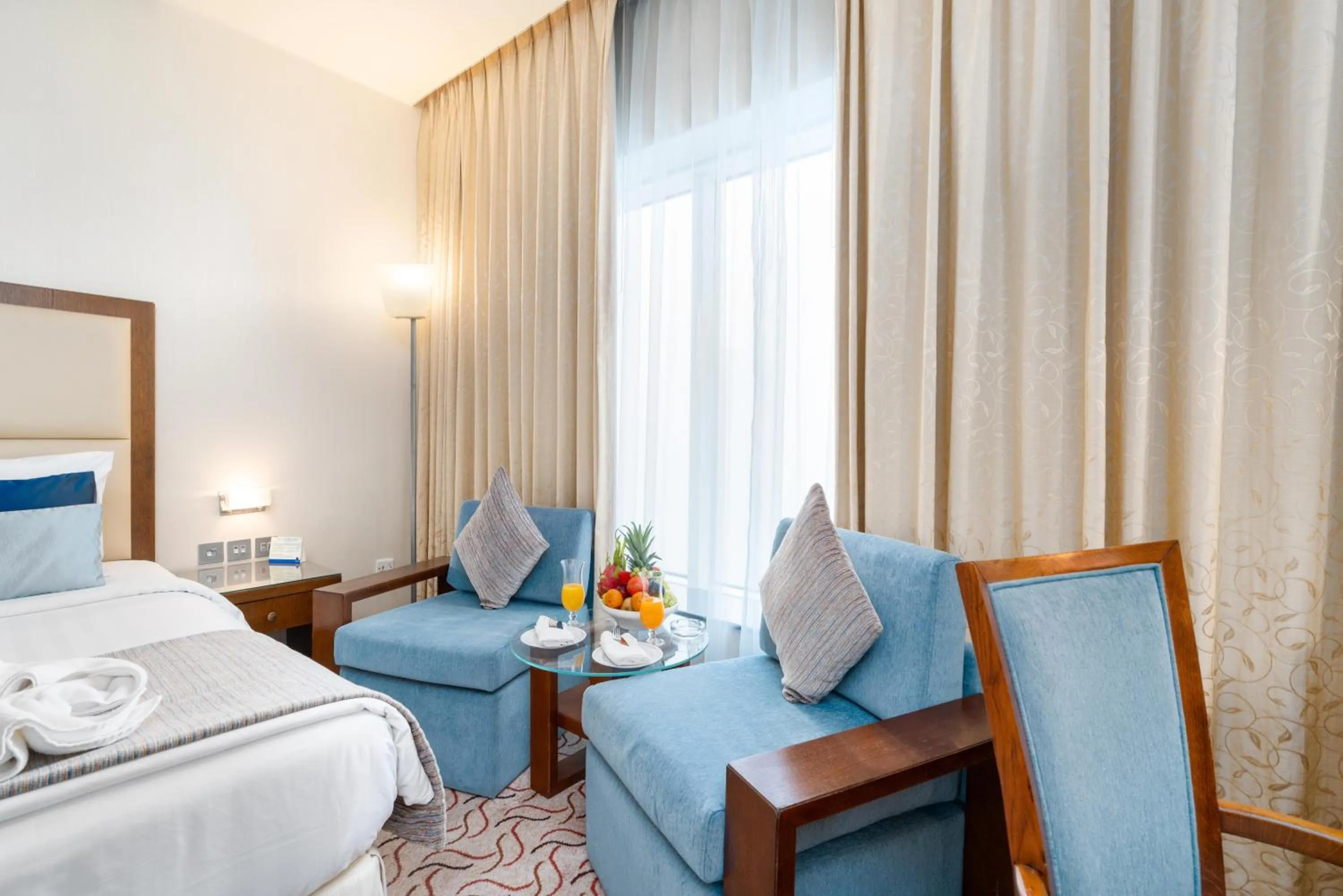 Seating area, Bed in Samaya Hotel Deira