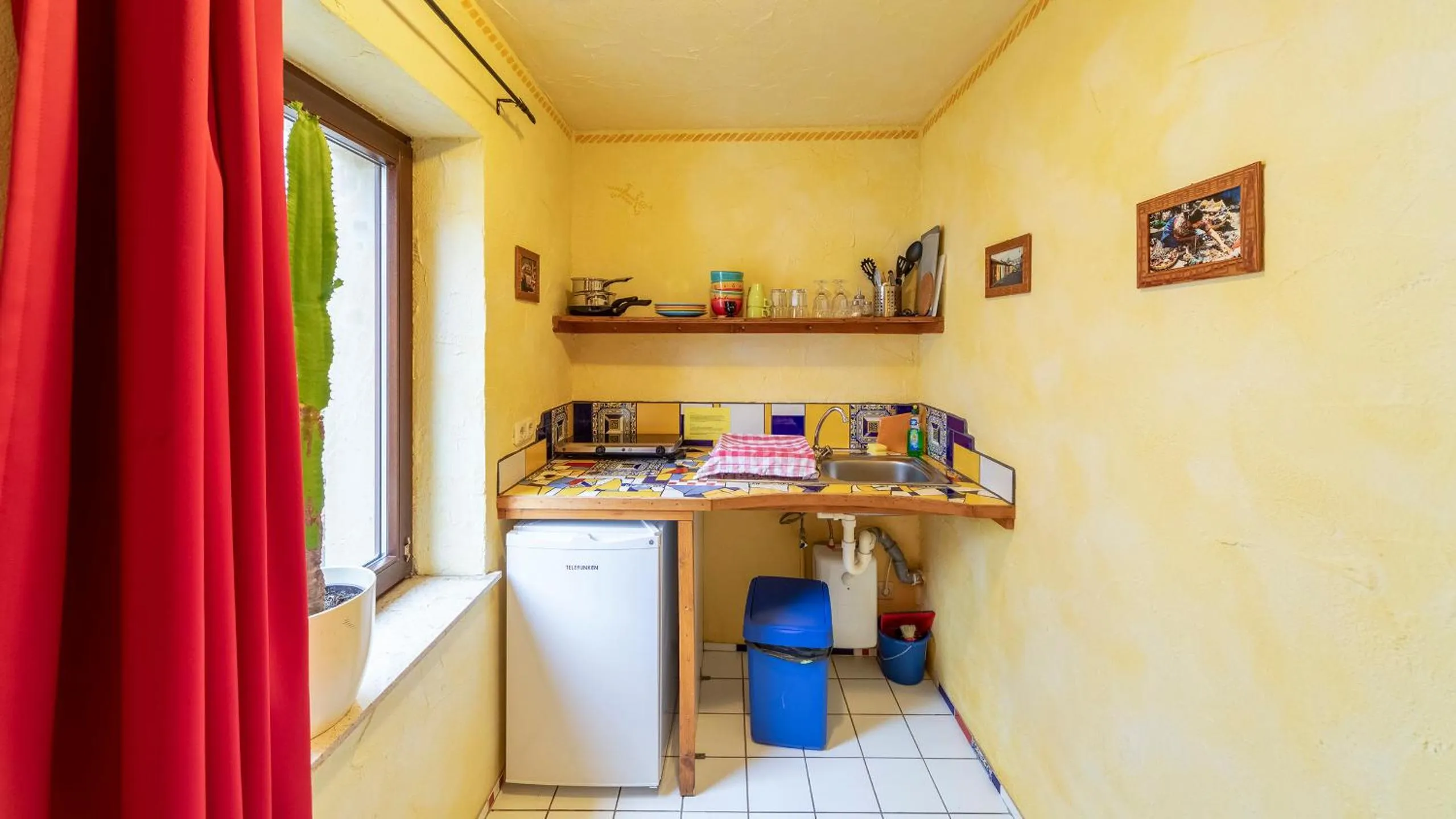 Kitchen or kitchenette in Gästehaus Mezcalero