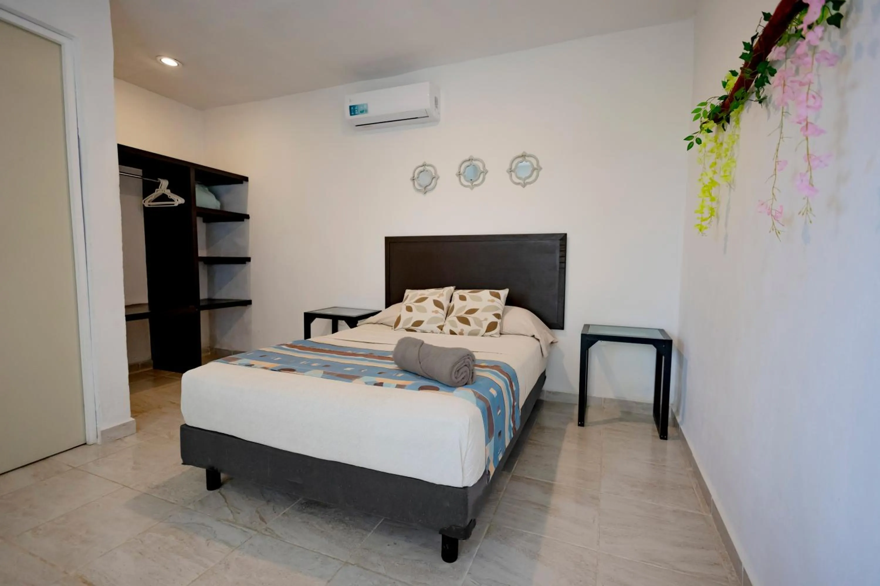 Bedroom, Bed in Puerto Morelos Hotel Las Palmas - Near the beach