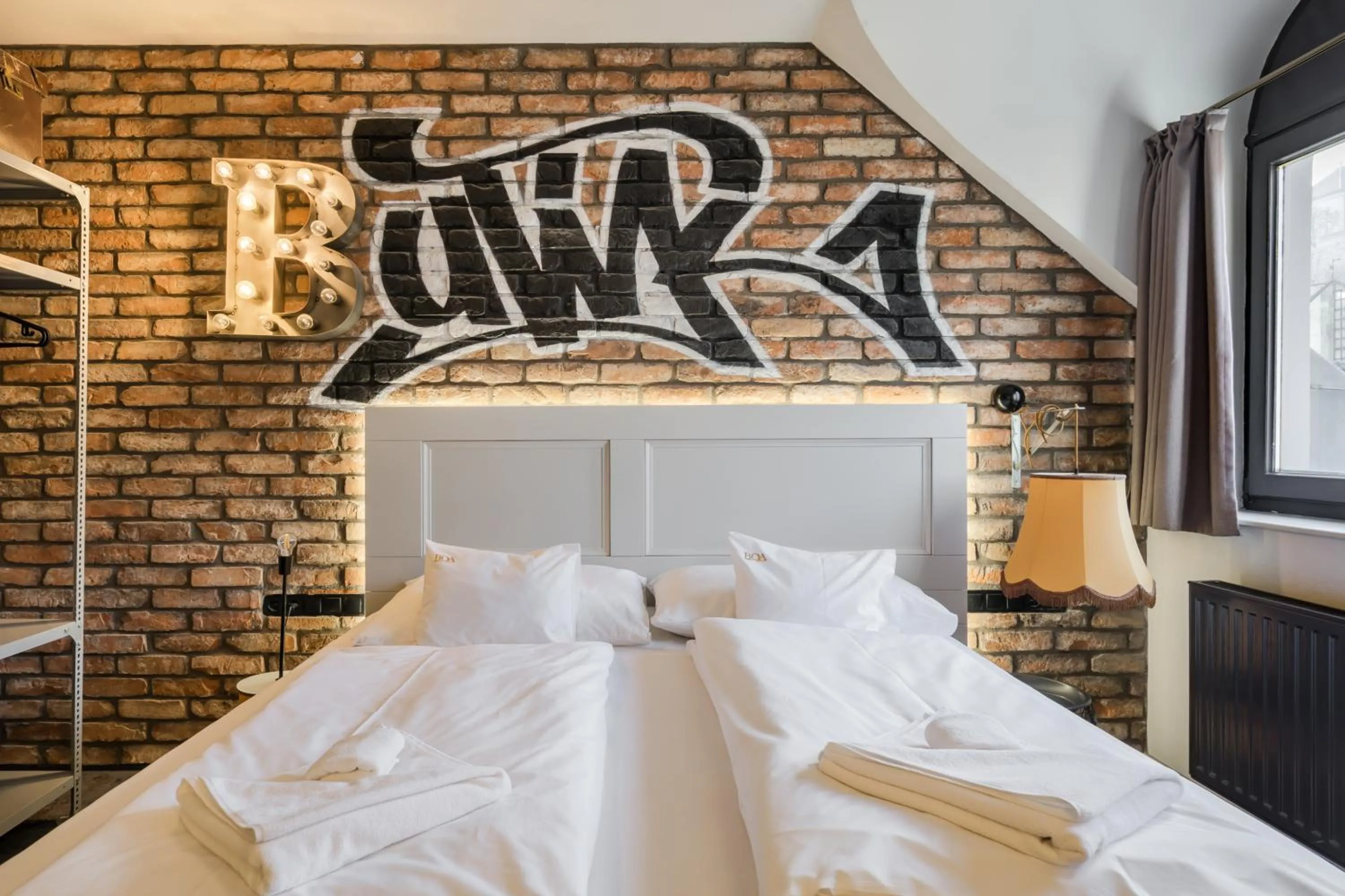 Bed in Butik Apartments, by BQA