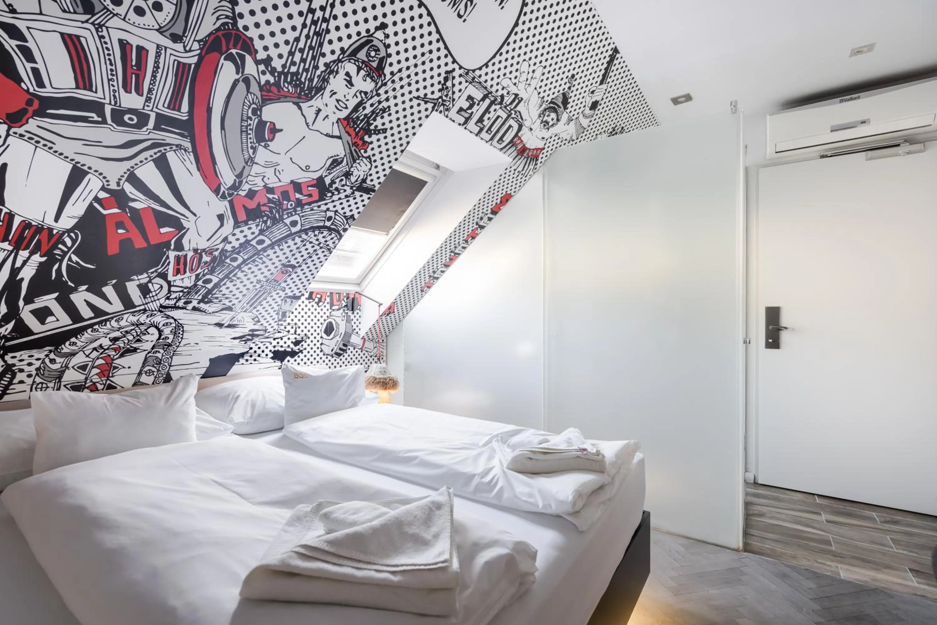 Bed in Butik Apartments, by BQA