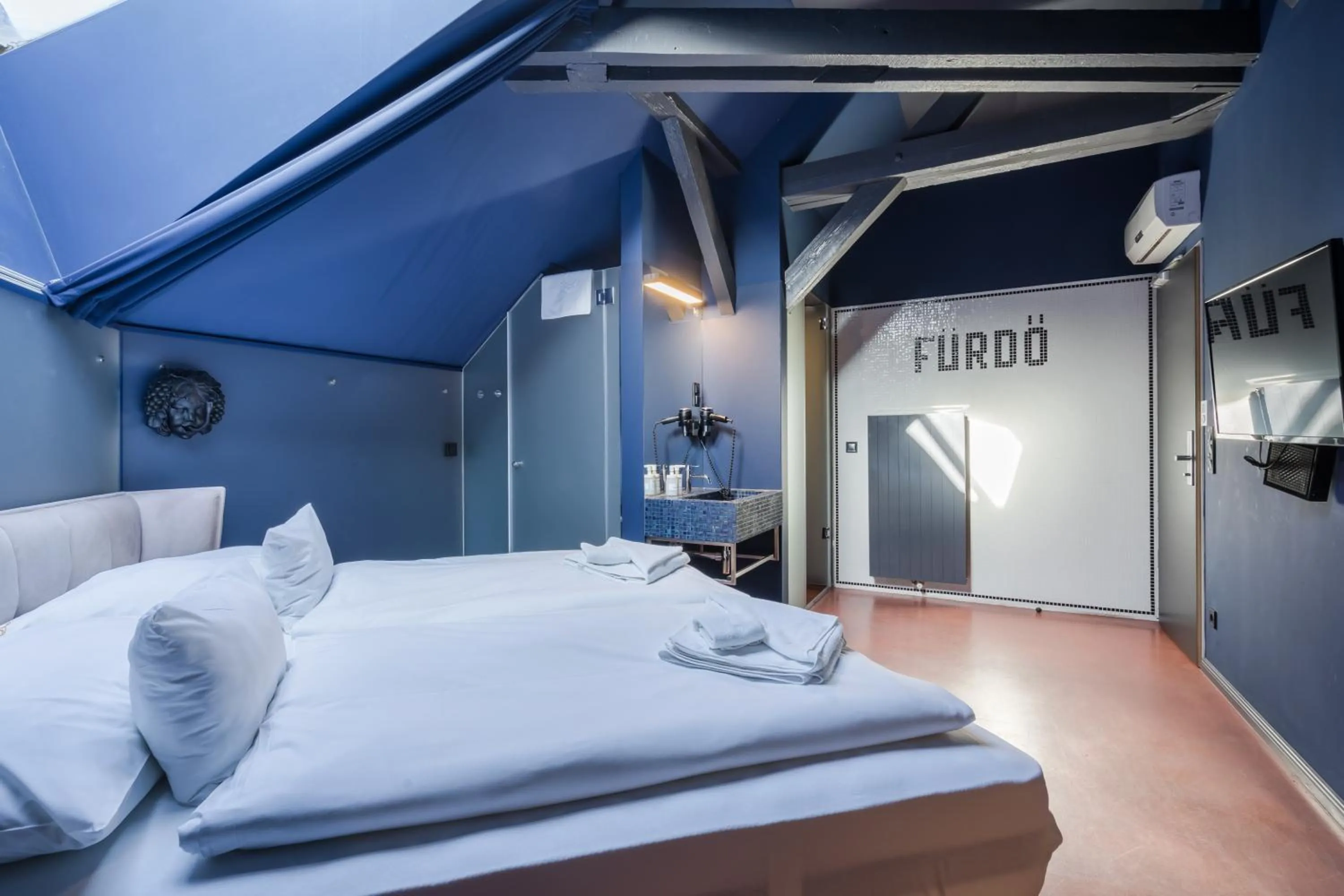 Toilet, Bed in Butik Apartments, by BQA