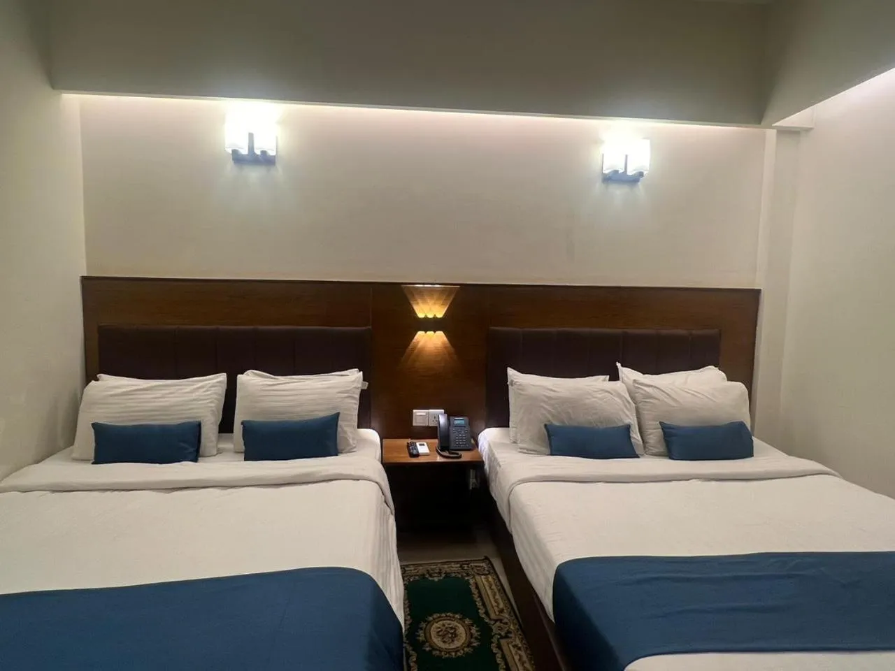 Bed in Hotel Kollol by J&Z Group