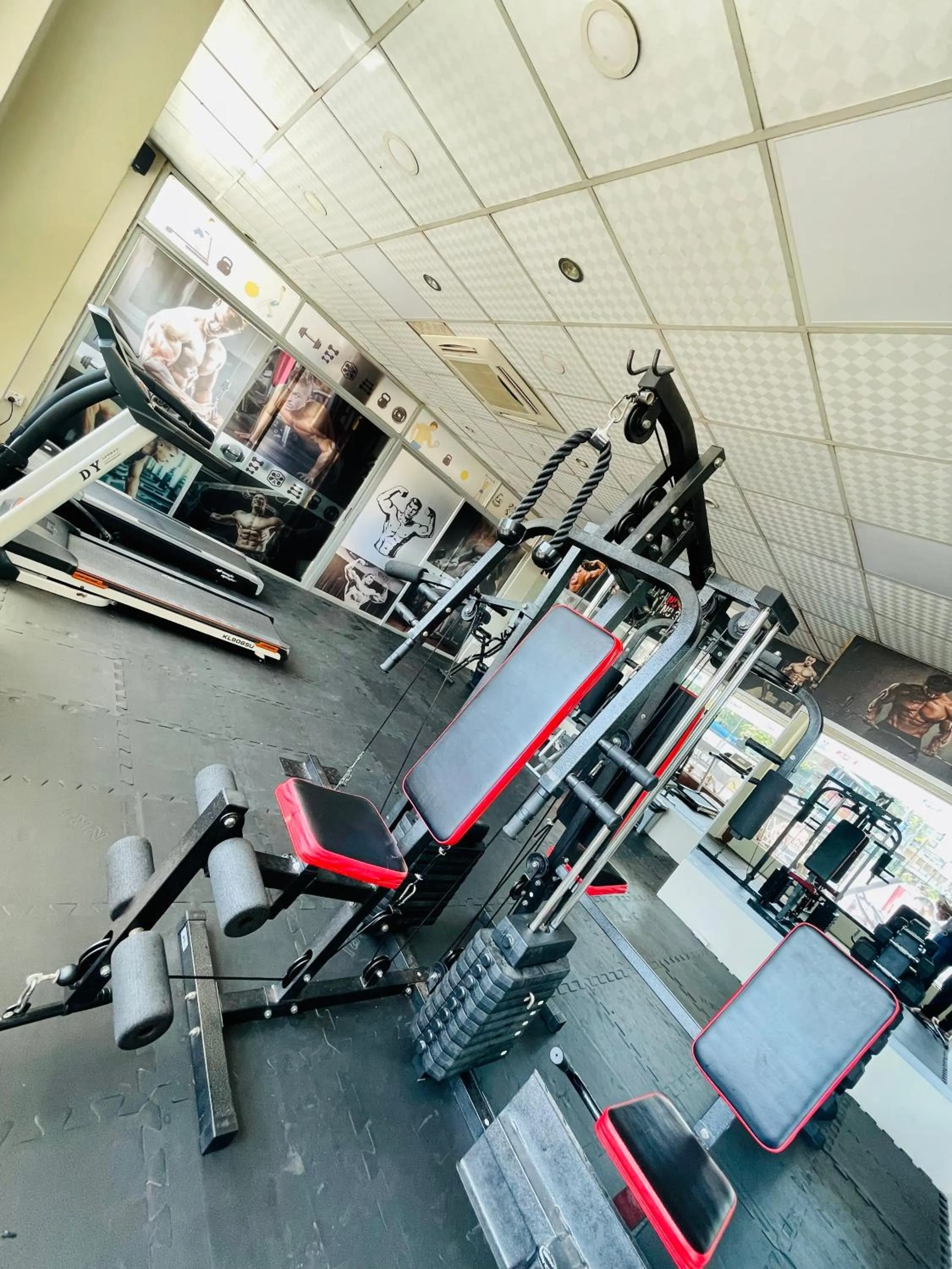 Fitness centre/facilities in Hotel Kollol by J&Z Group