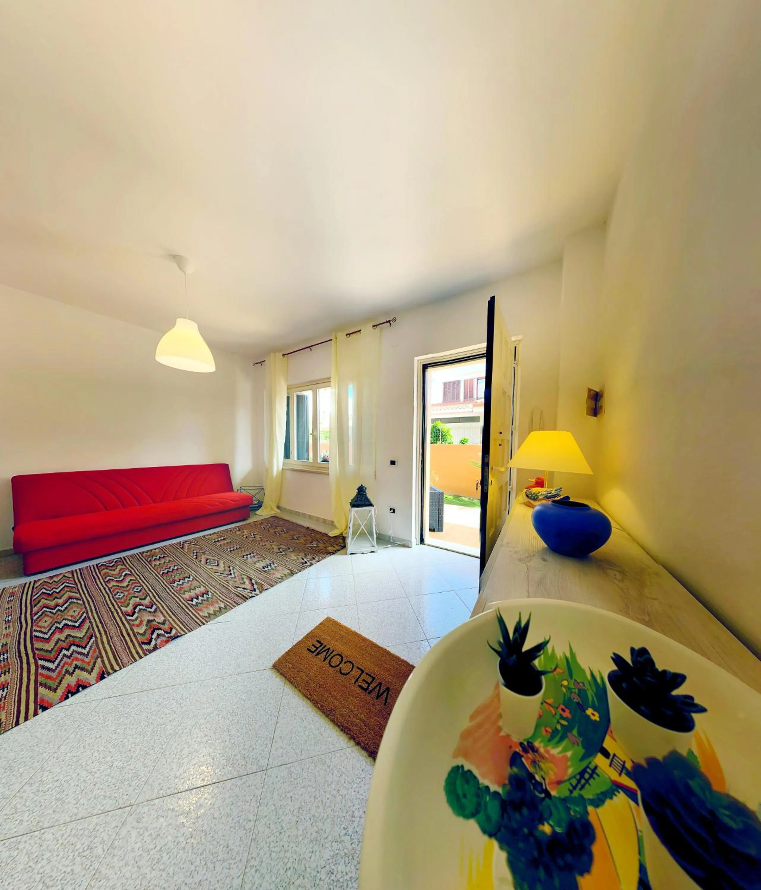 Living room, Bed in Piana Apartment