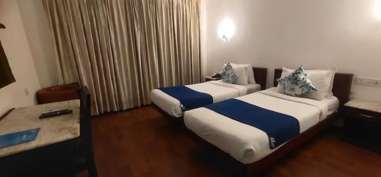 Bed in AQUARIA THE BOUTIQUE RESORT