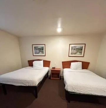 Bed in WoodSpring Suites Columbus near Fort Benning