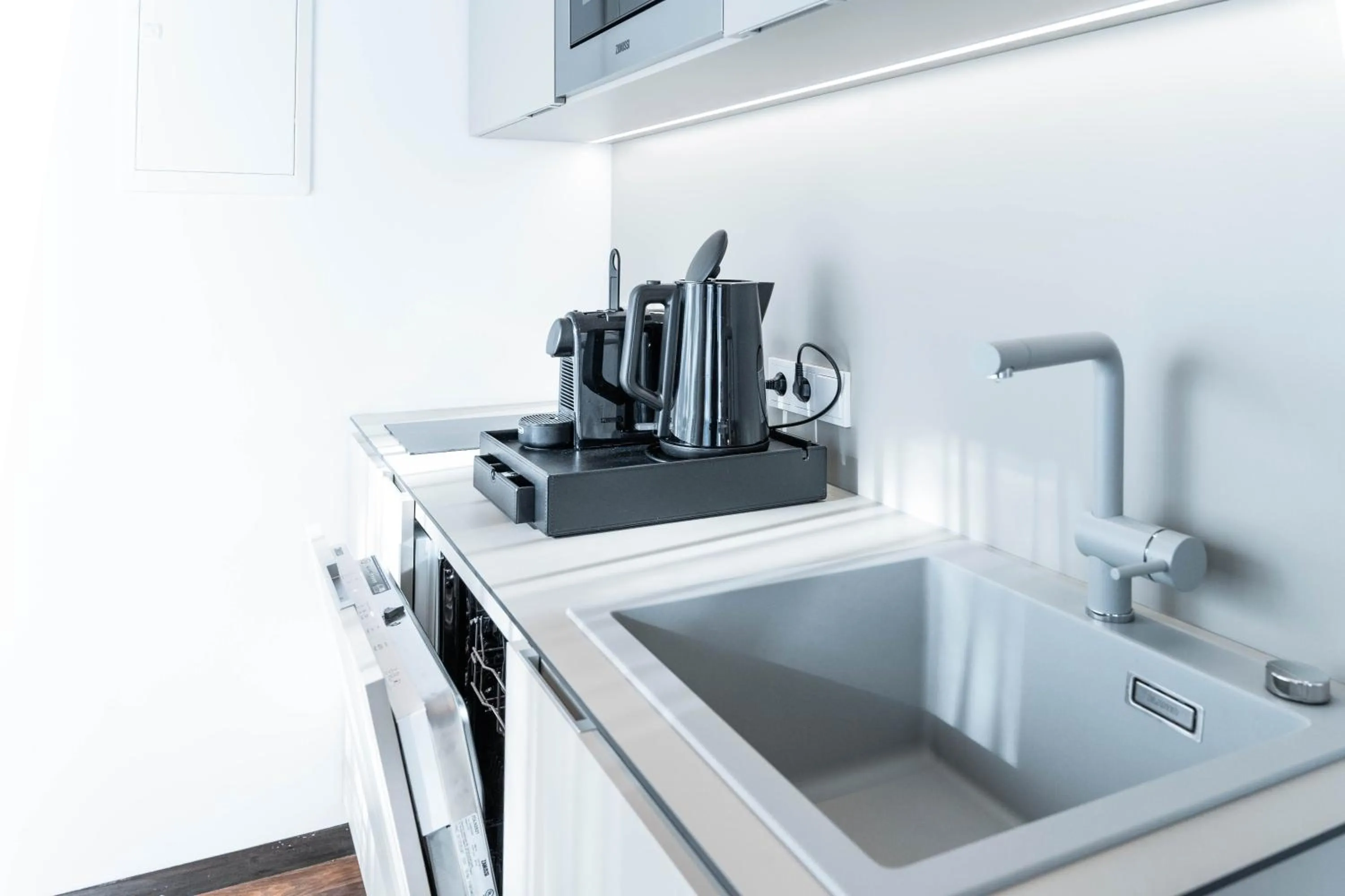 Kitchen or kitchenette in Blackhome Innsbruck City South I contactless check-in