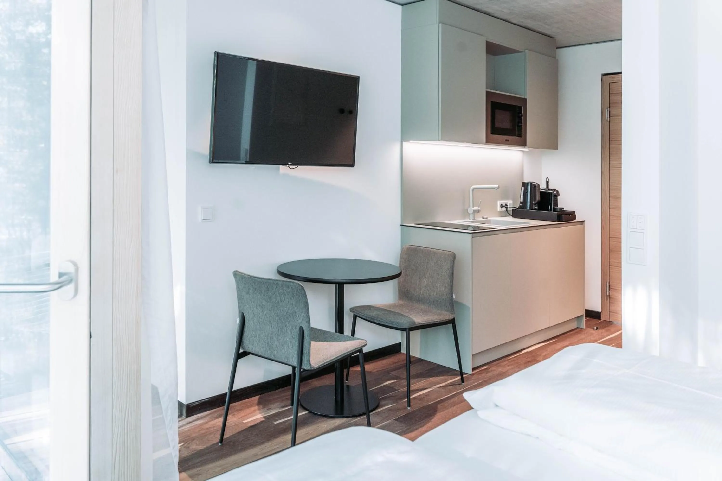 Kitchen or kitchenette in Blackhome Innsbruck City South I contactless check-in