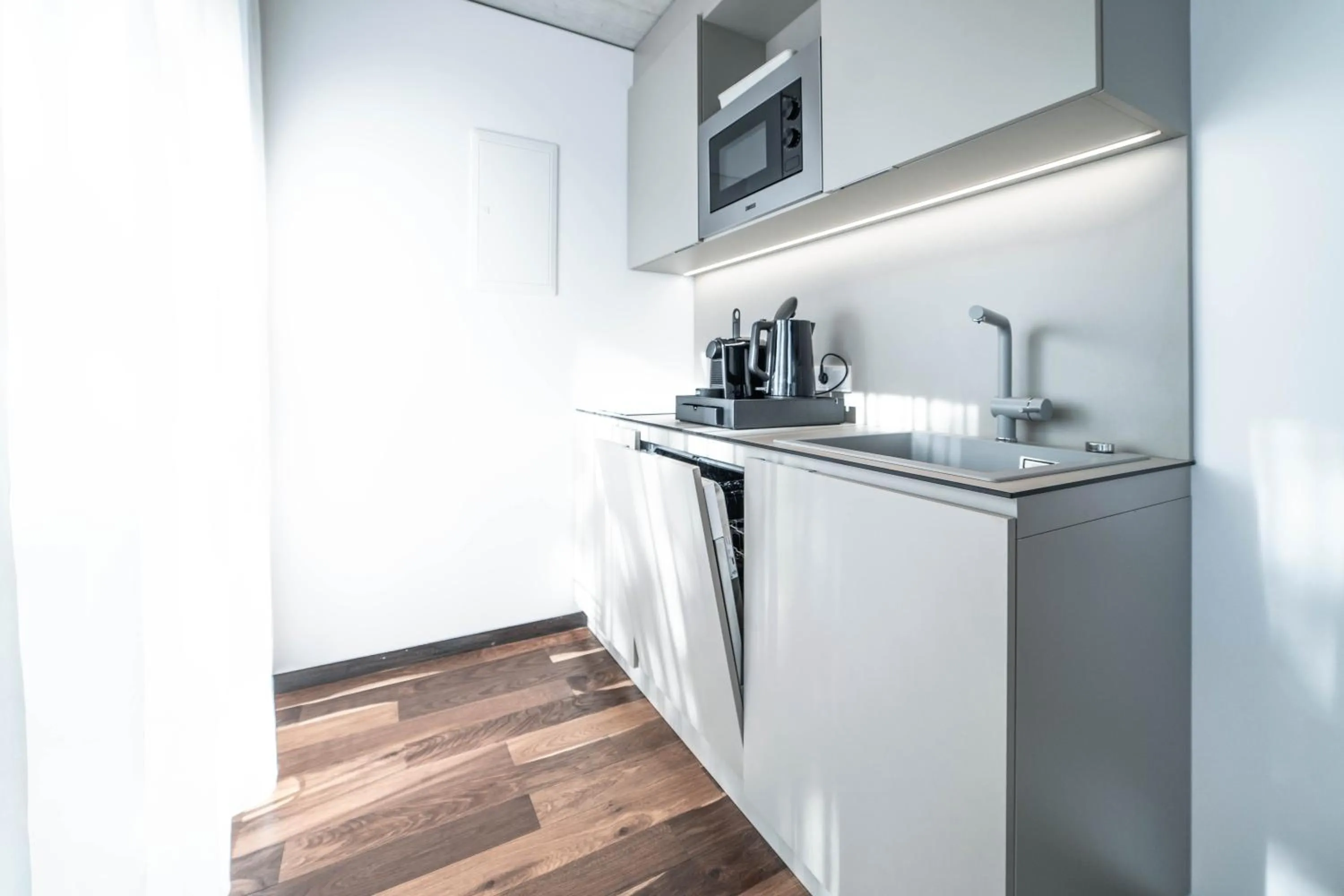 Kitchen or kitchenette in Blackhome Innsbruck City South I contactless check-in
