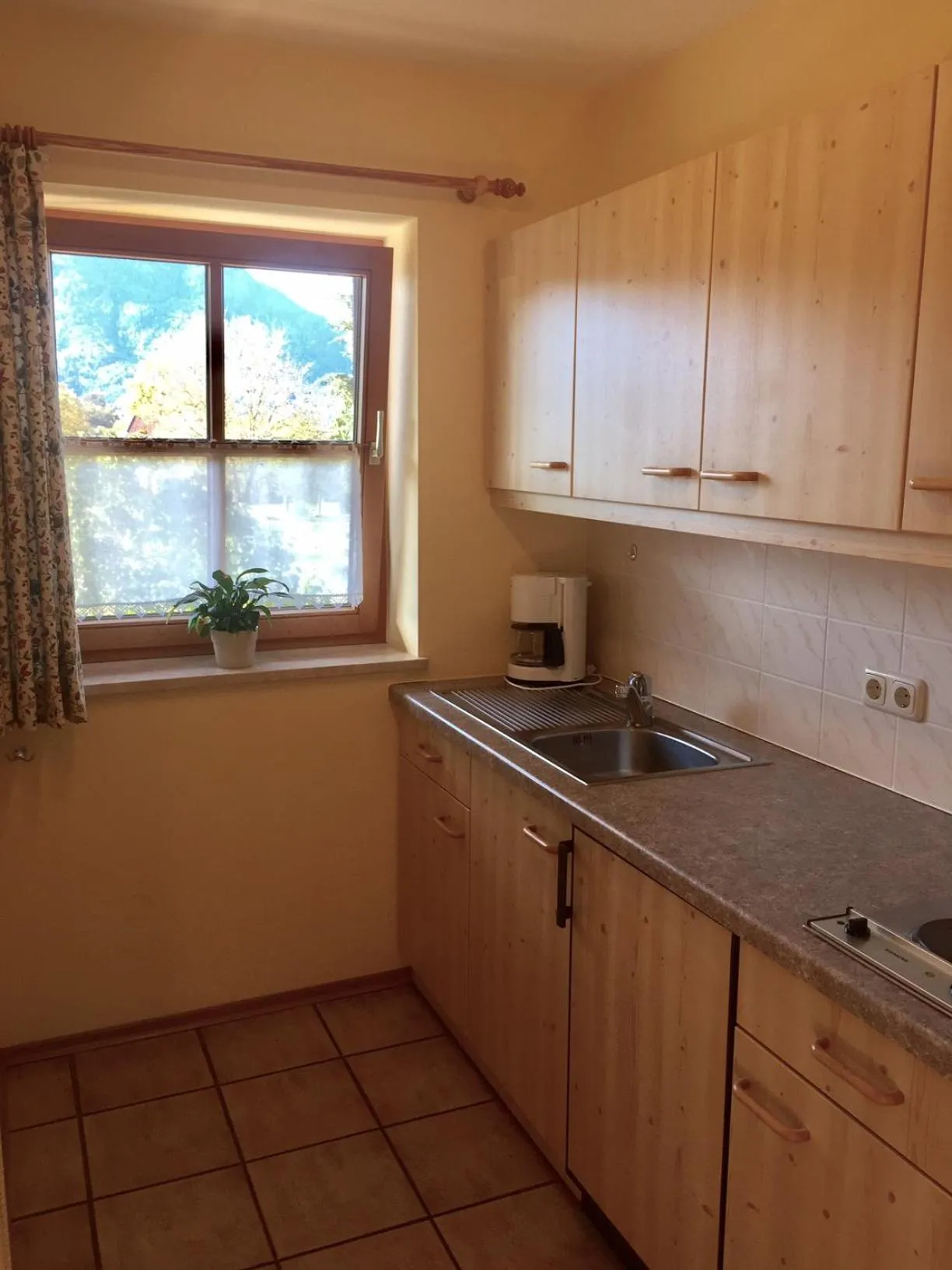 Kitchen or kitchenette in DEVA Achentaler Vitalhotel