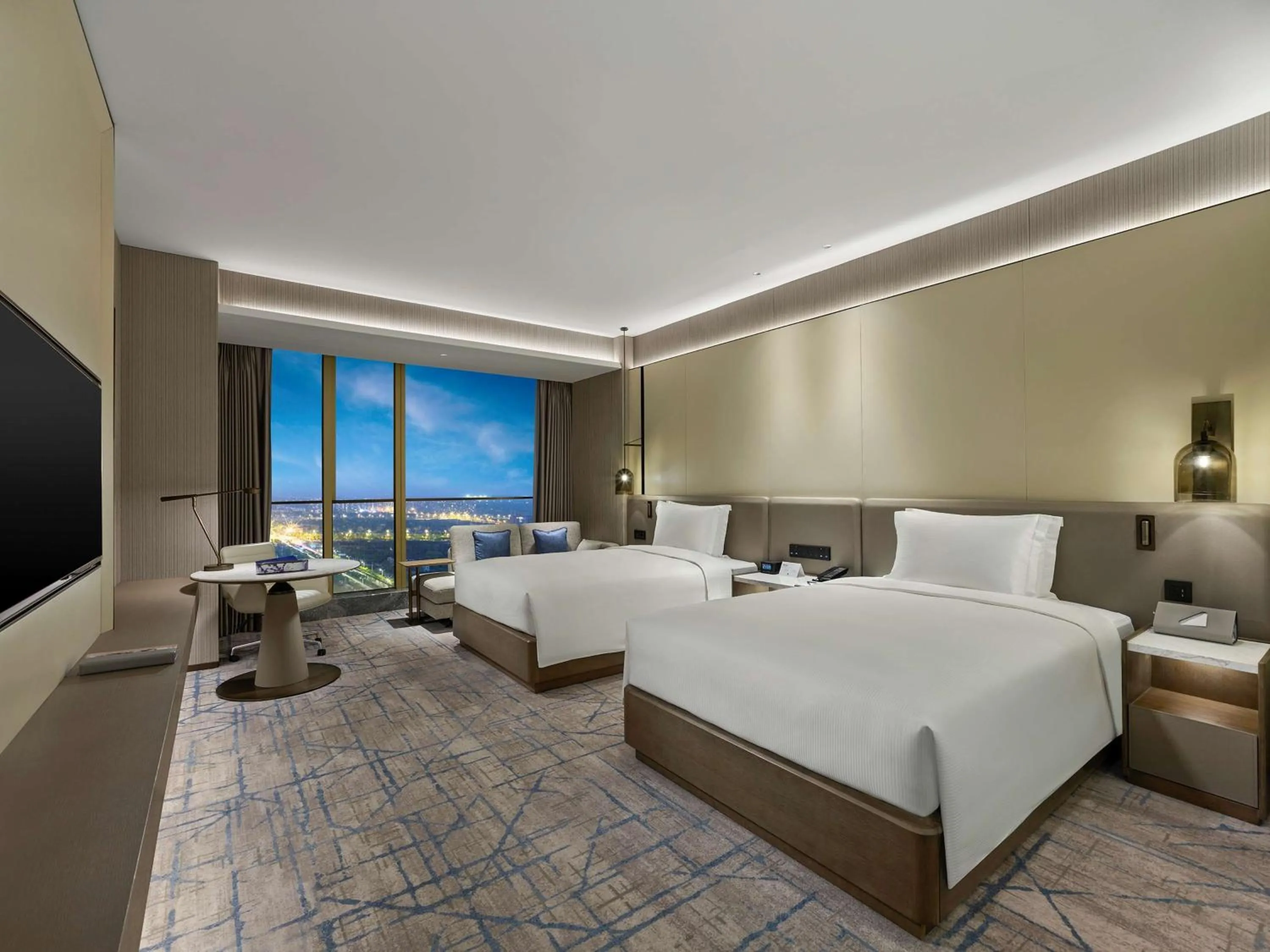 Bed in DoubleTree by Hilton Qidong