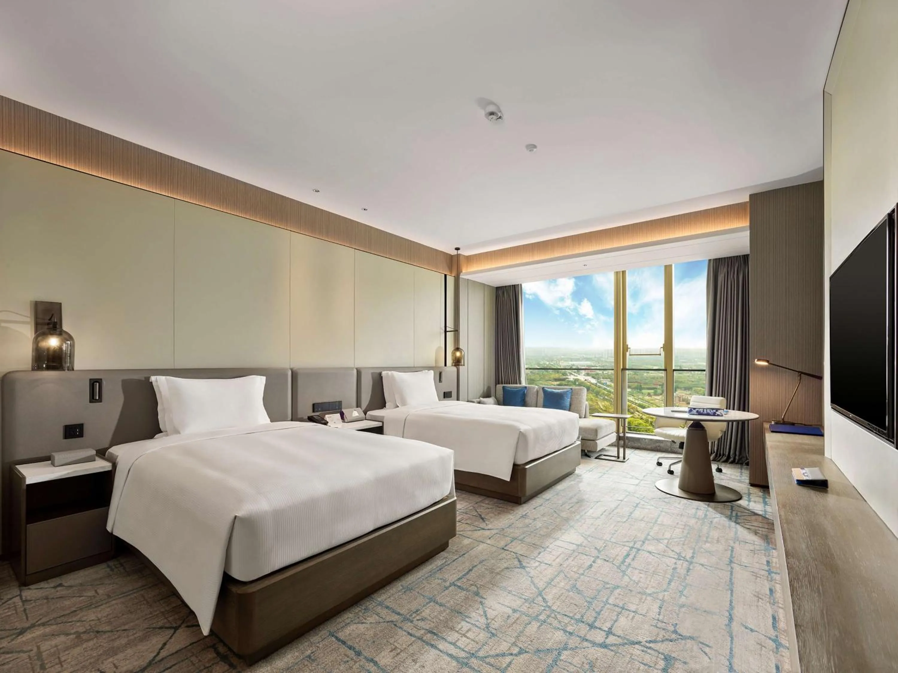 Bed in DoubleTree by Hilton Qidong