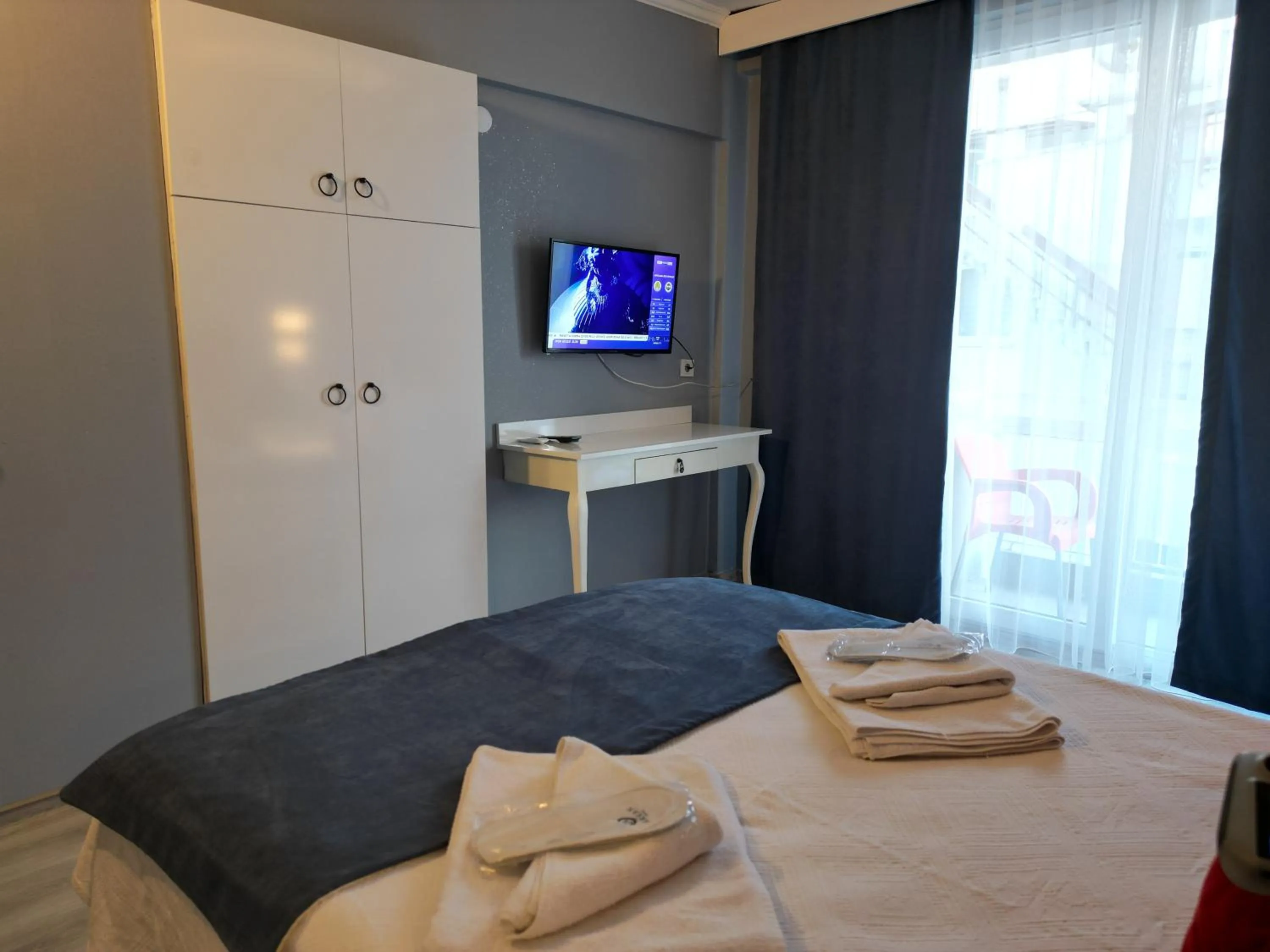 Bed in Akman City Hotel