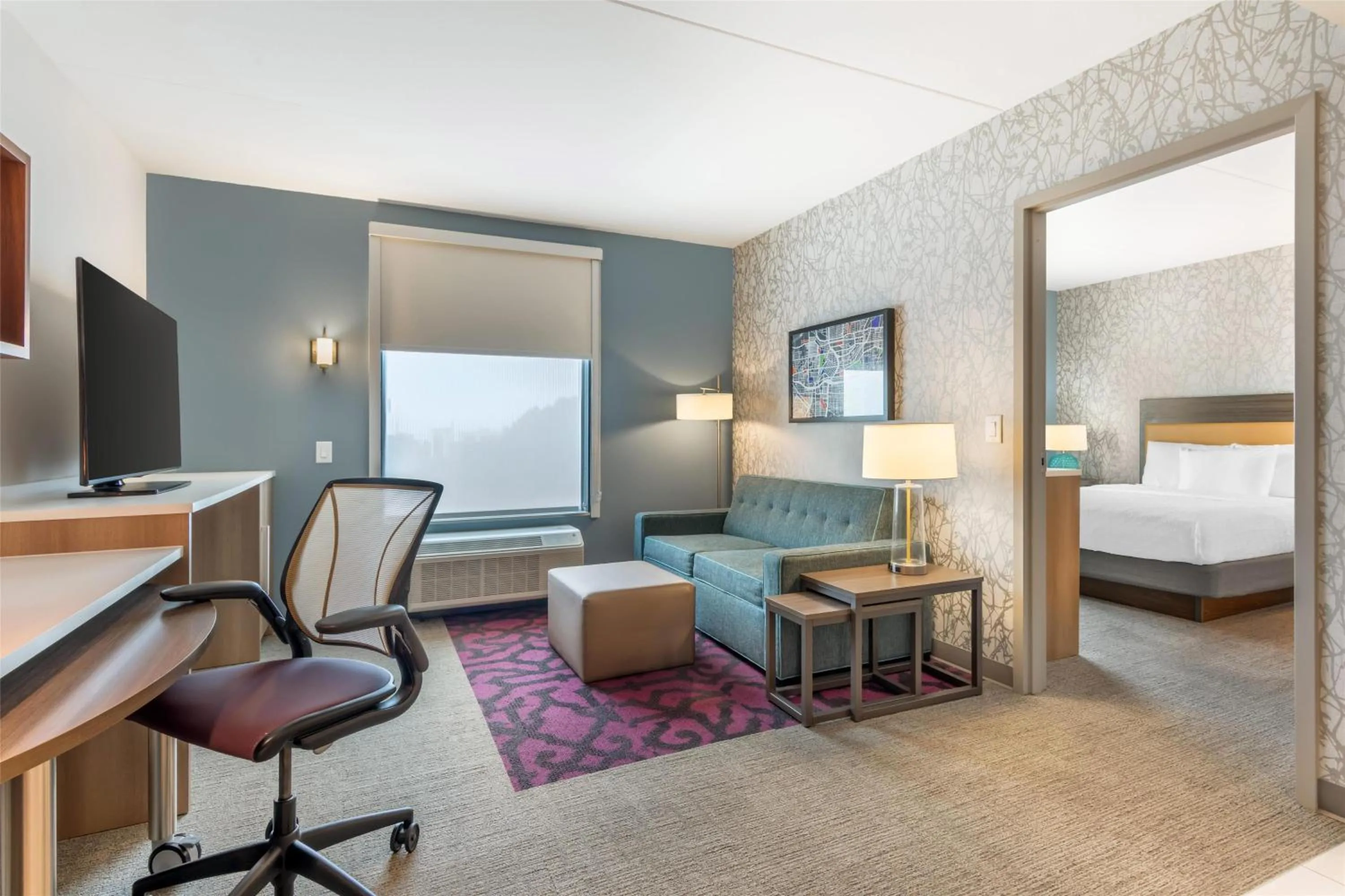 Living room, Bed in Home2 Suites by Hilton Atlanta Airport North