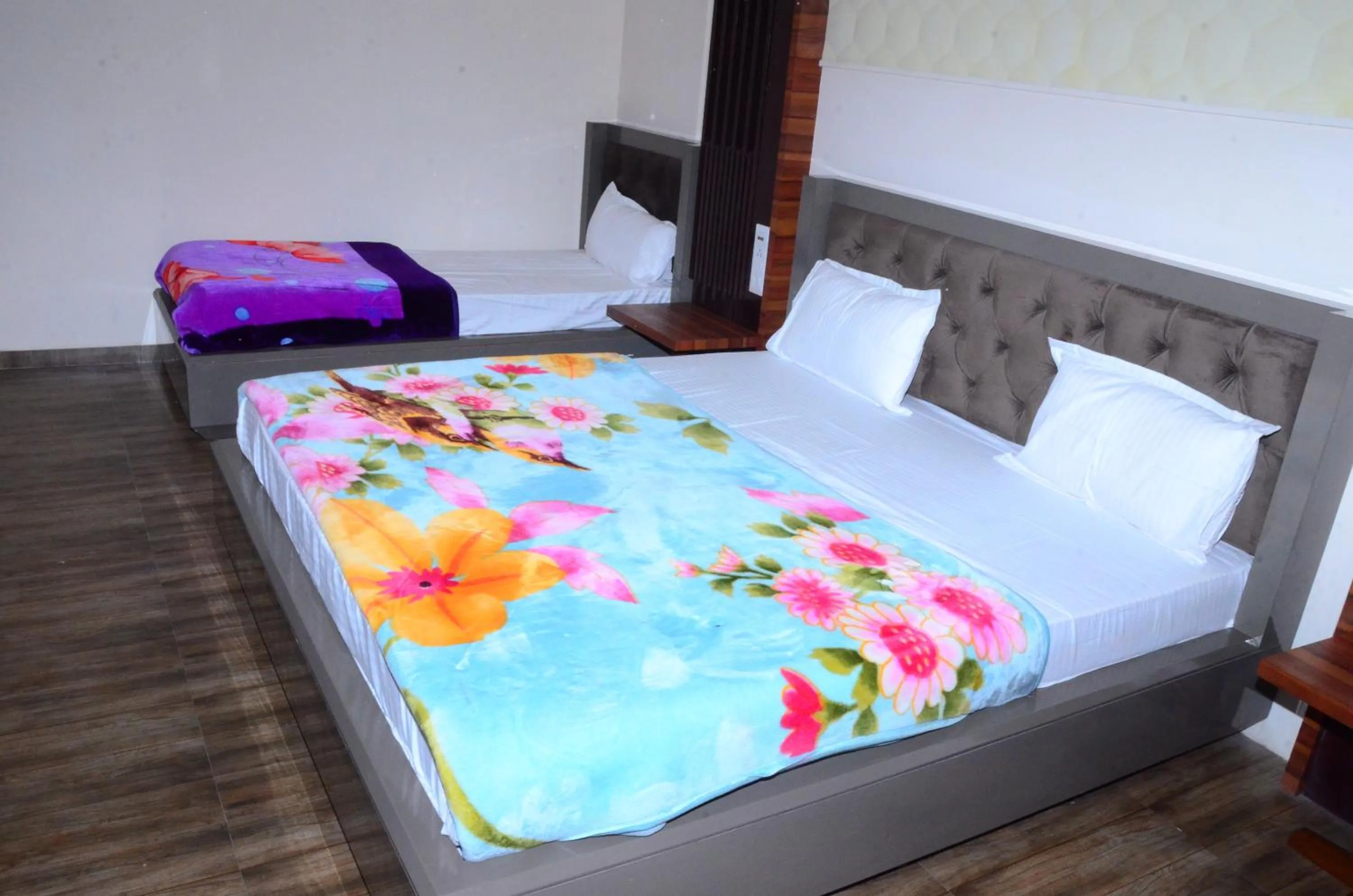 Bed in DUDI HOTEL