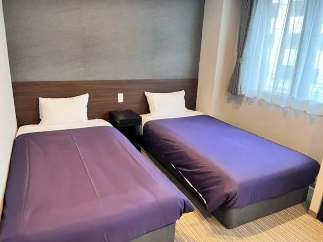 Bed in Hotel Classe Stay Chitose