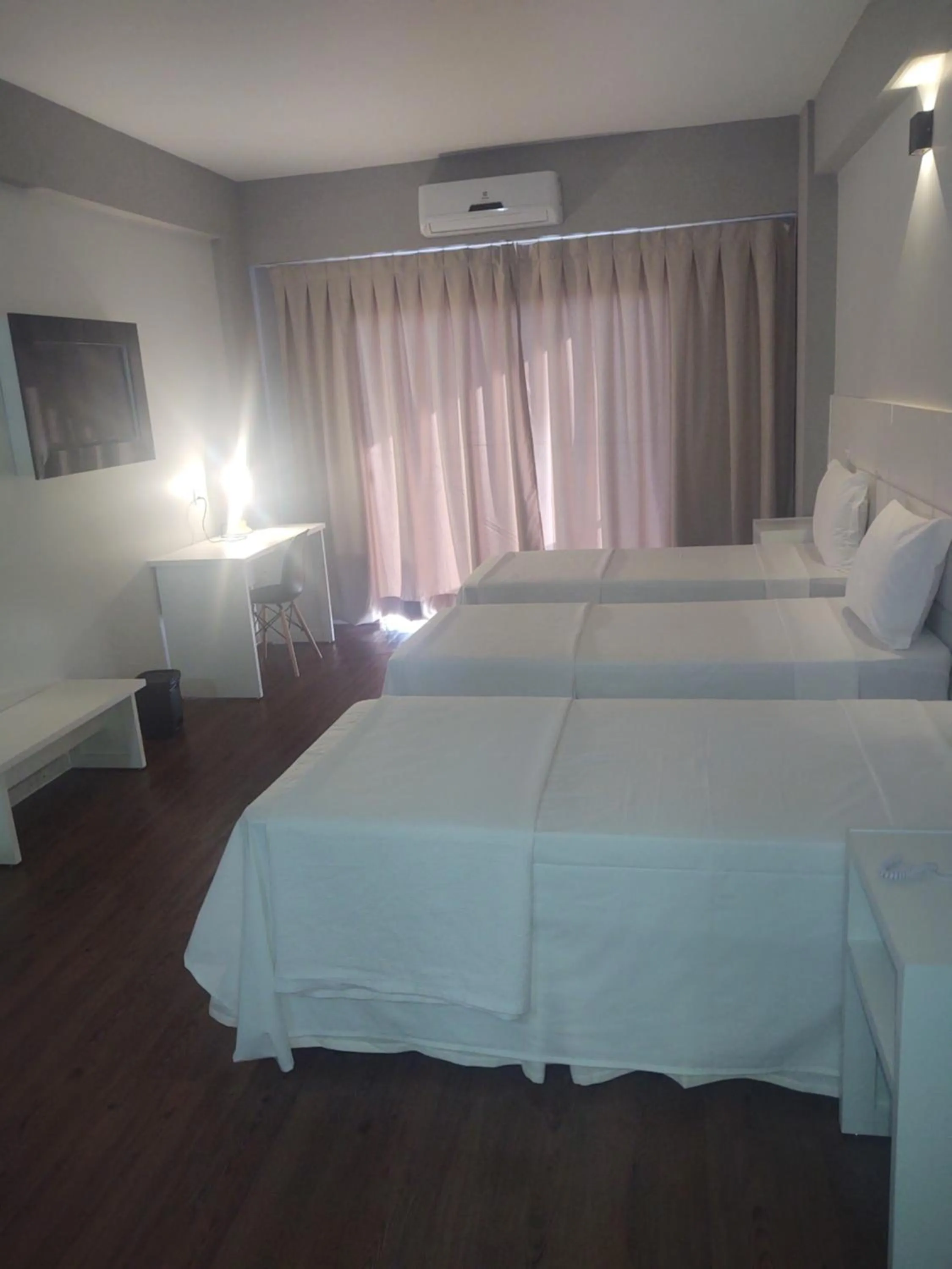 Bed in Hotel Quartzo