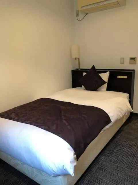 Bed in Hotel Plaisir Tachikawa