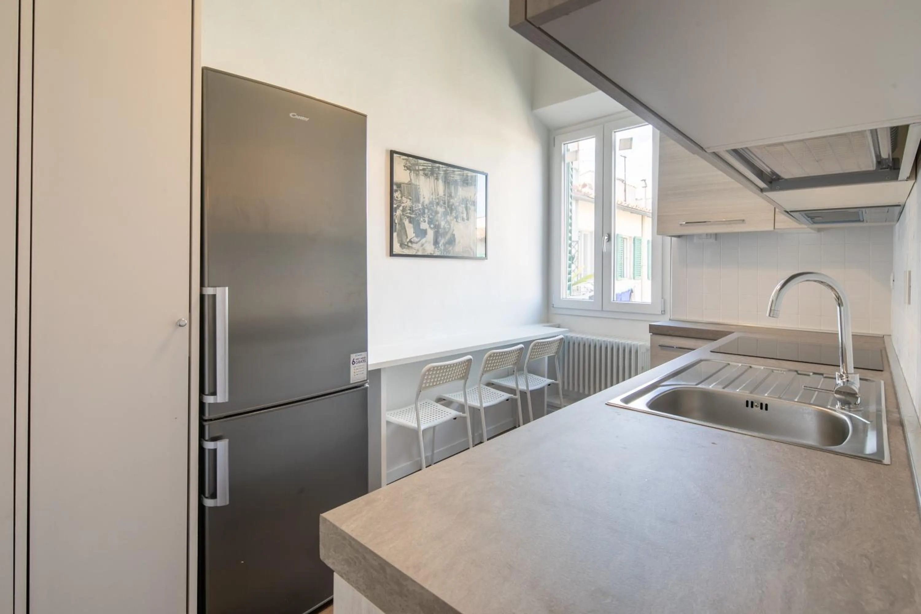 Kitchen or kitchenette in Indipendenza House by Mmega