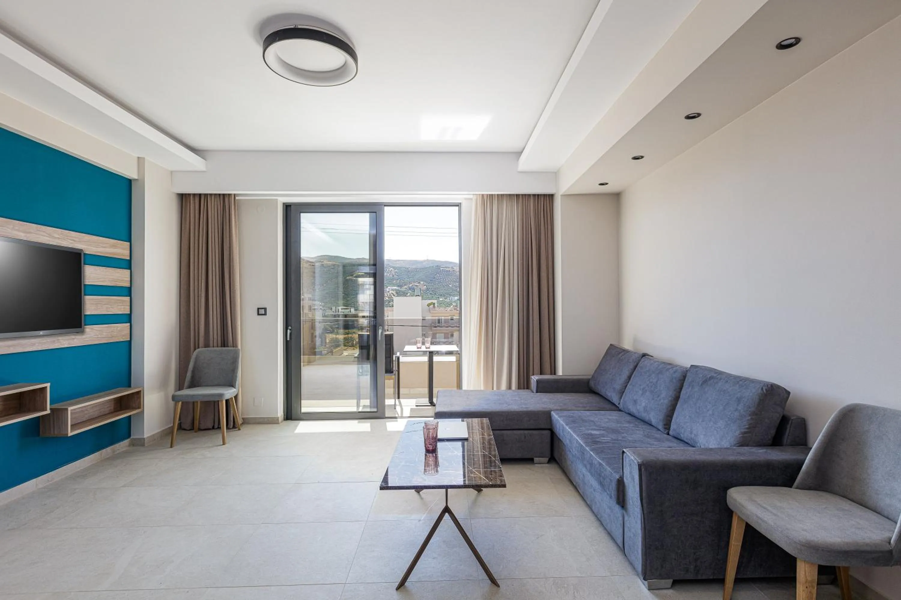 Living room in Sapphire Blue Suites