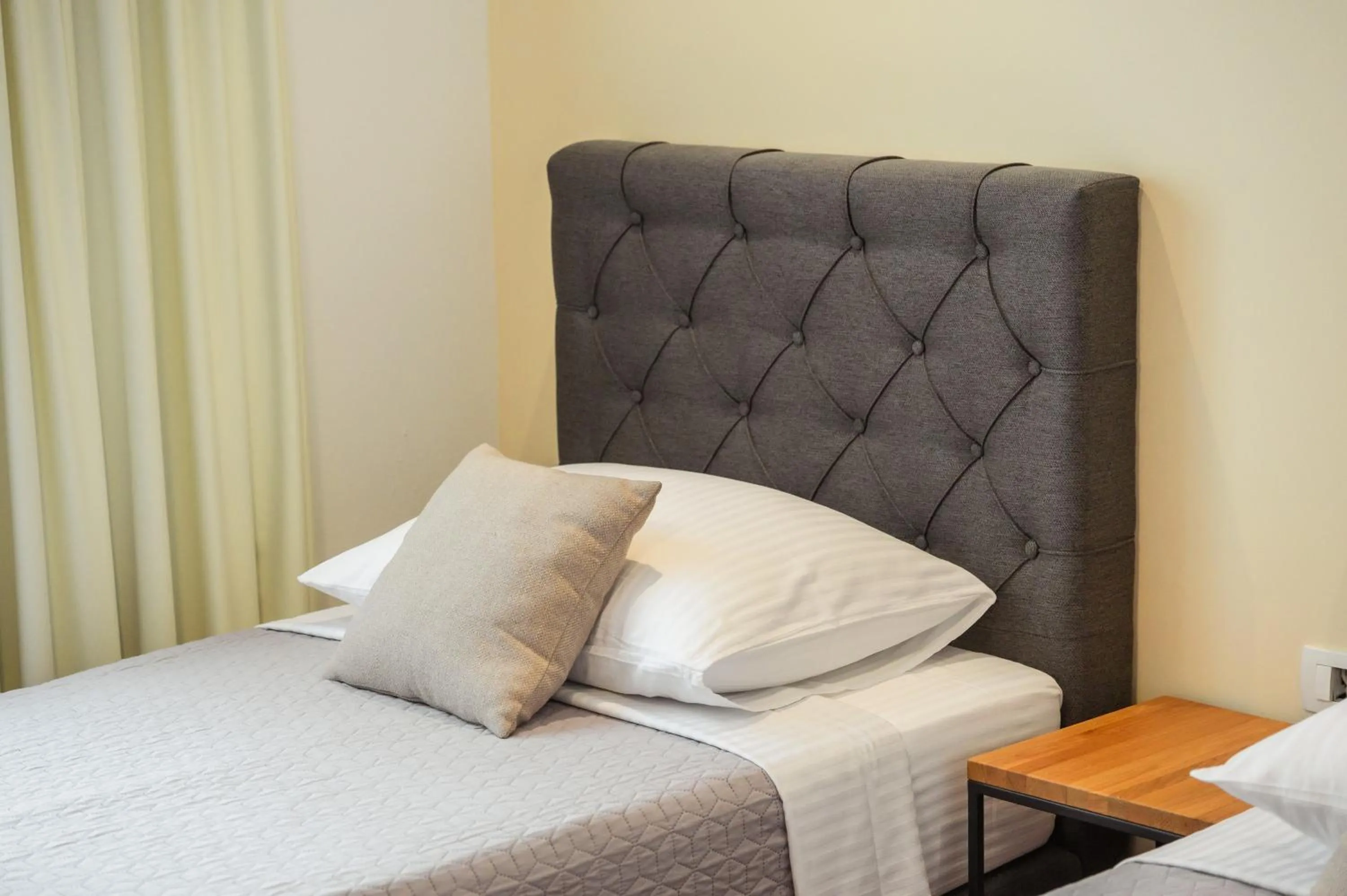 Bed in Boutique rooms Kican