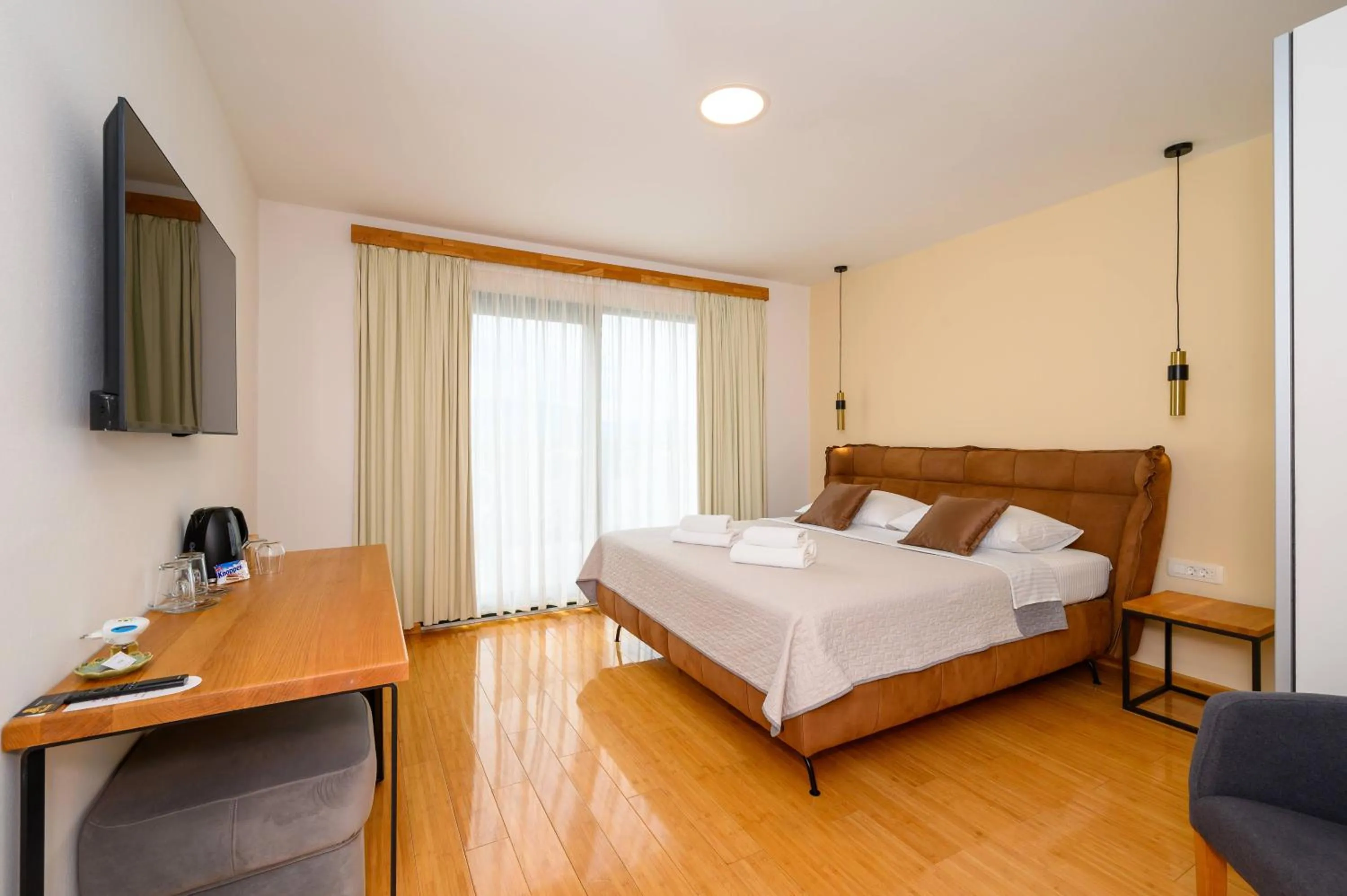 Bed in Boutique rooms Kican