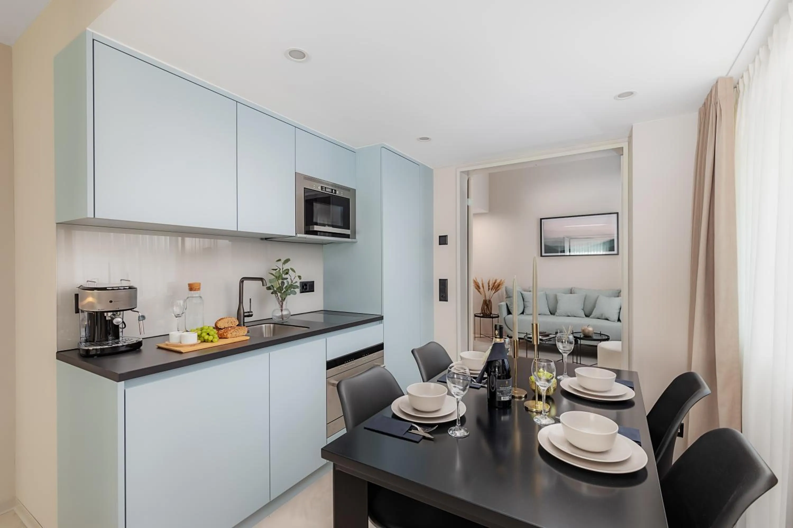 Kitchen or kitchenette in VISIONAPARTMENTS Basel - contactless check-in