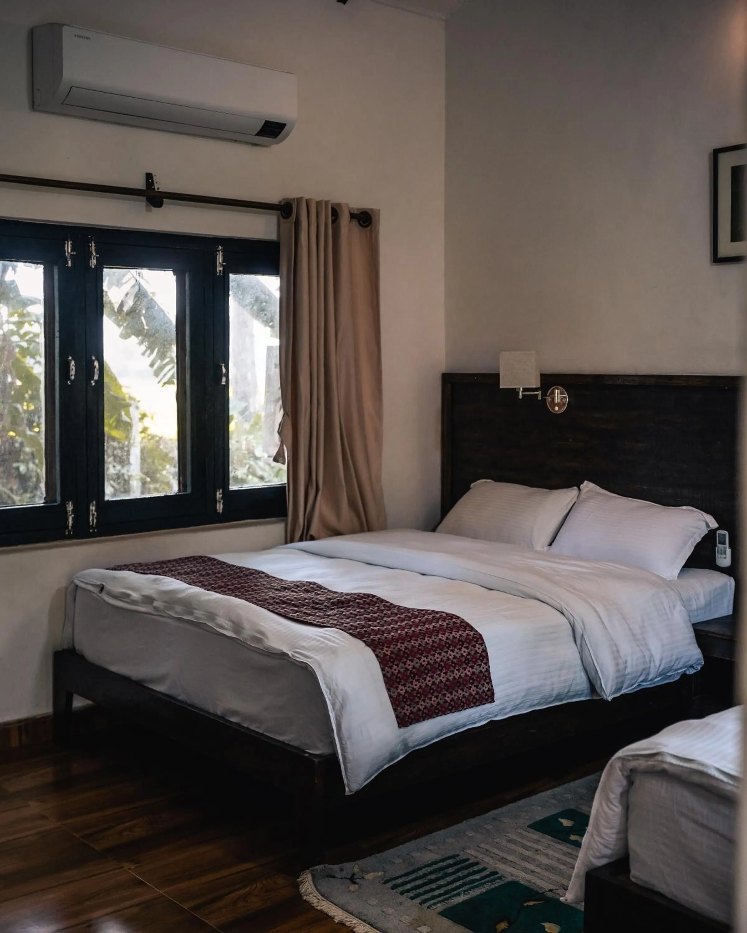Bed in Bardia Forest Resort