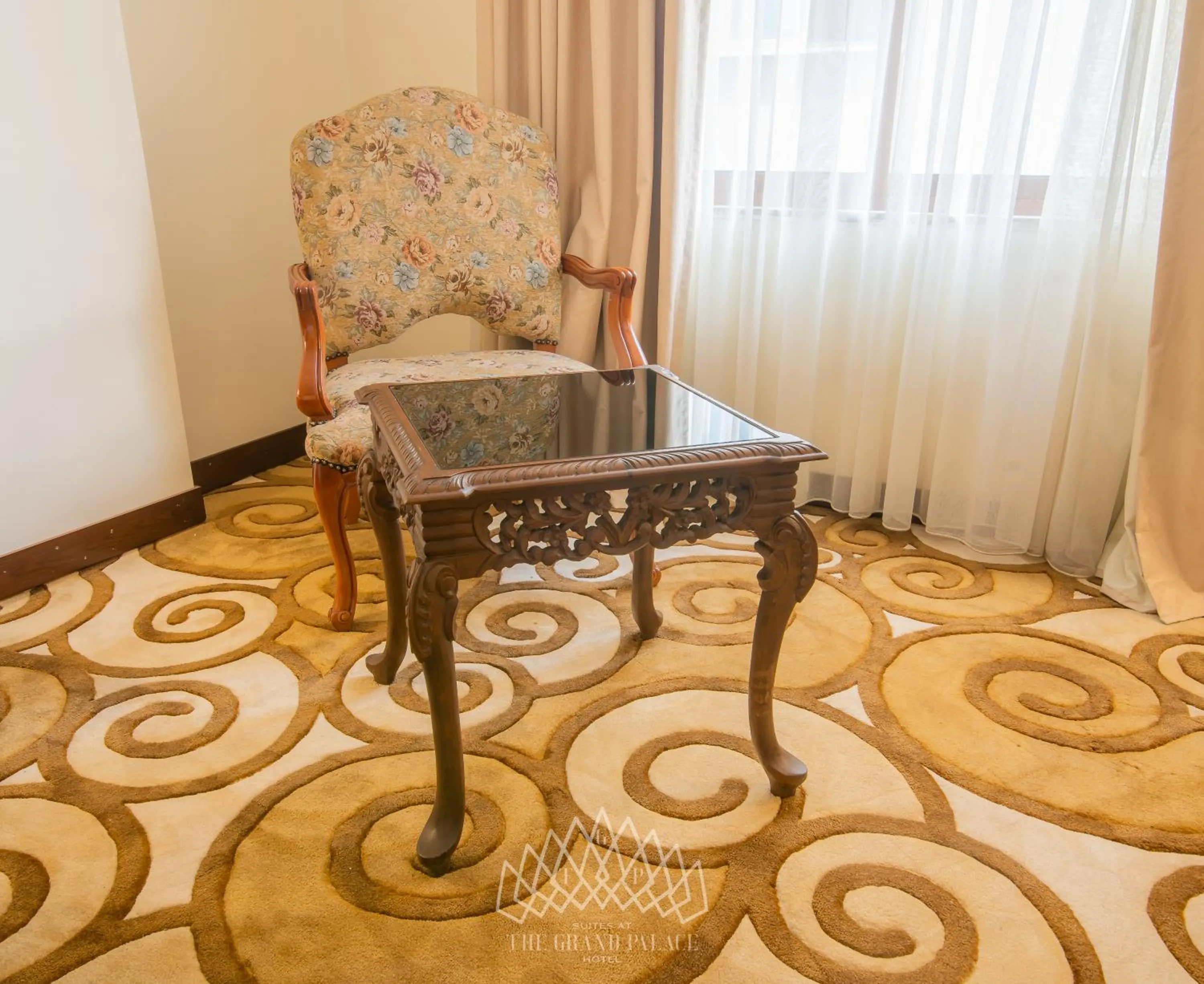 Seating area in The Grand Palace Hotel