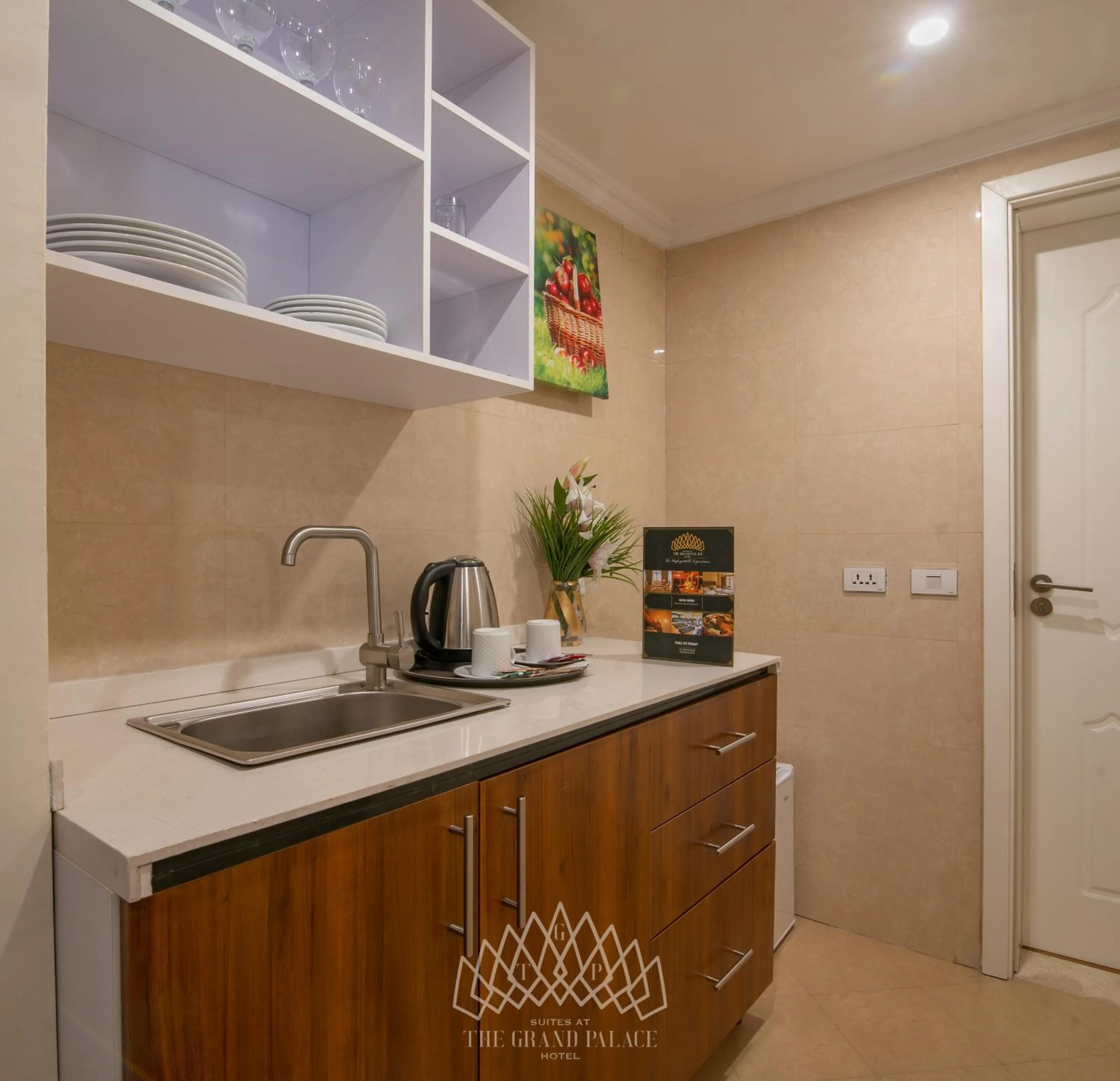 Kitchen or kitchenette in The Grand Palace Hotel