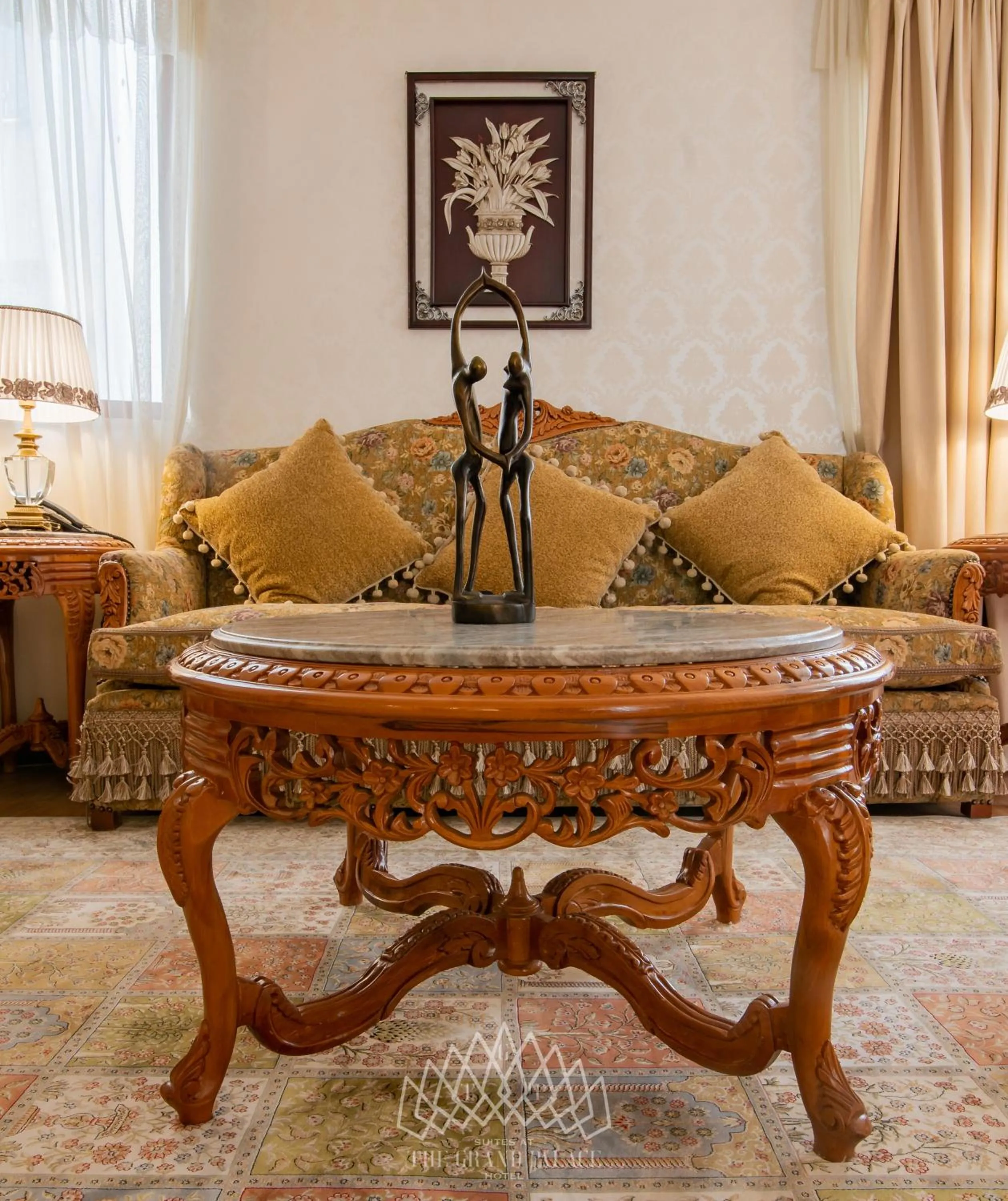 Living room in The Grand Palace Hotel